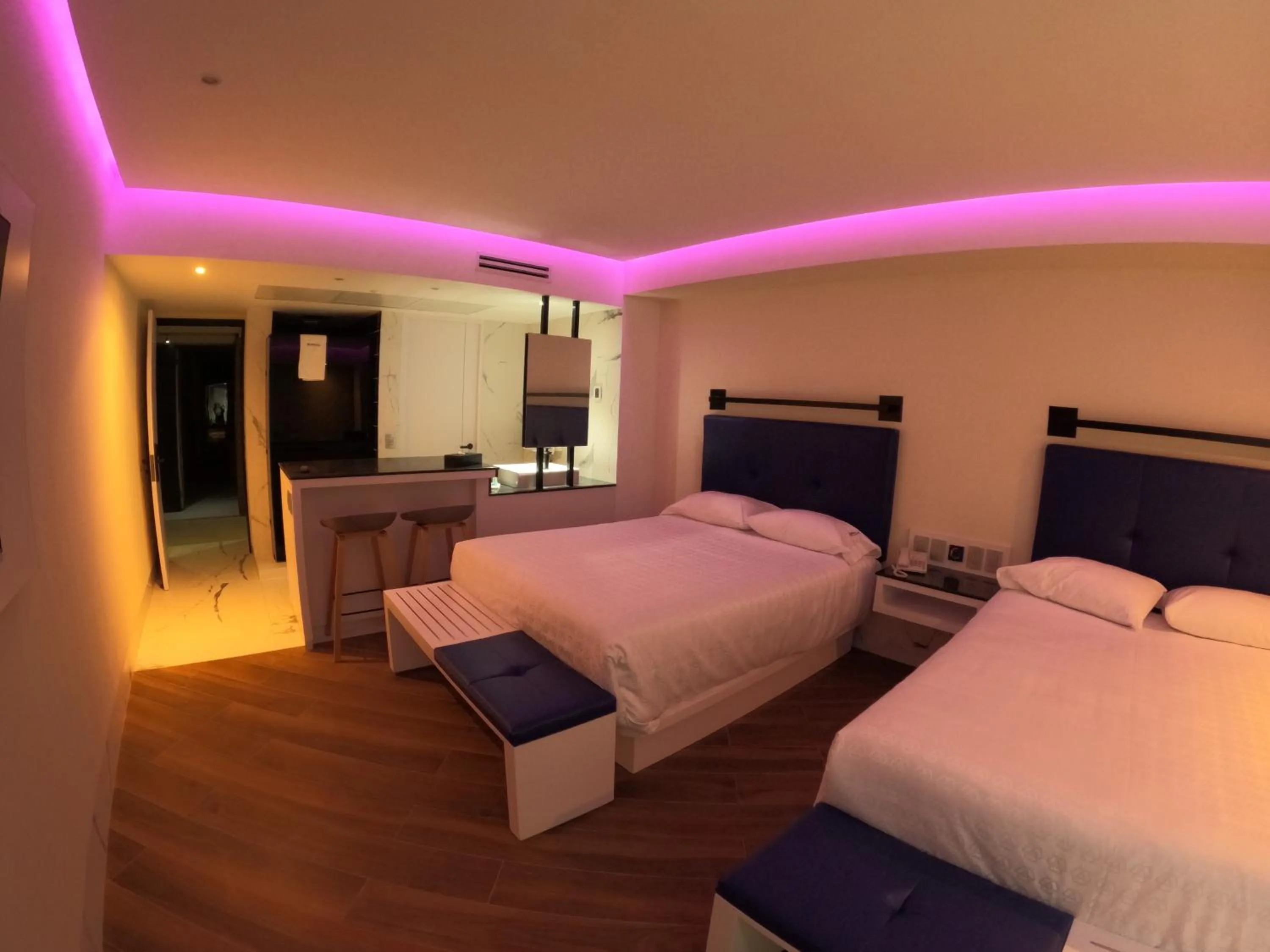 Bed in WeEnjoy Hotels Grand Prix Aeropuerto CDMX