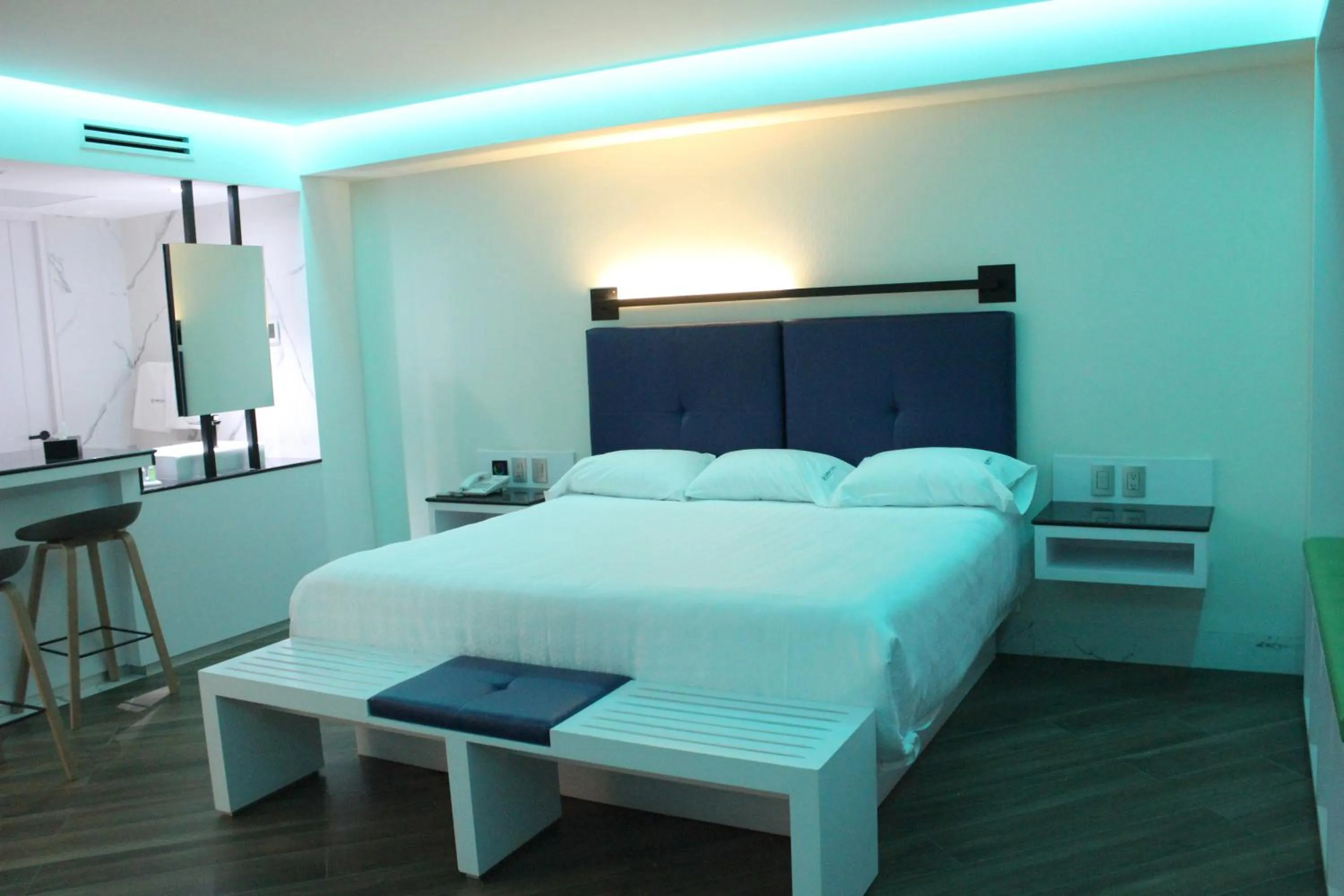 Bed in WeEnjoy Hotels Grand Prix Aeropuerto CDMX
