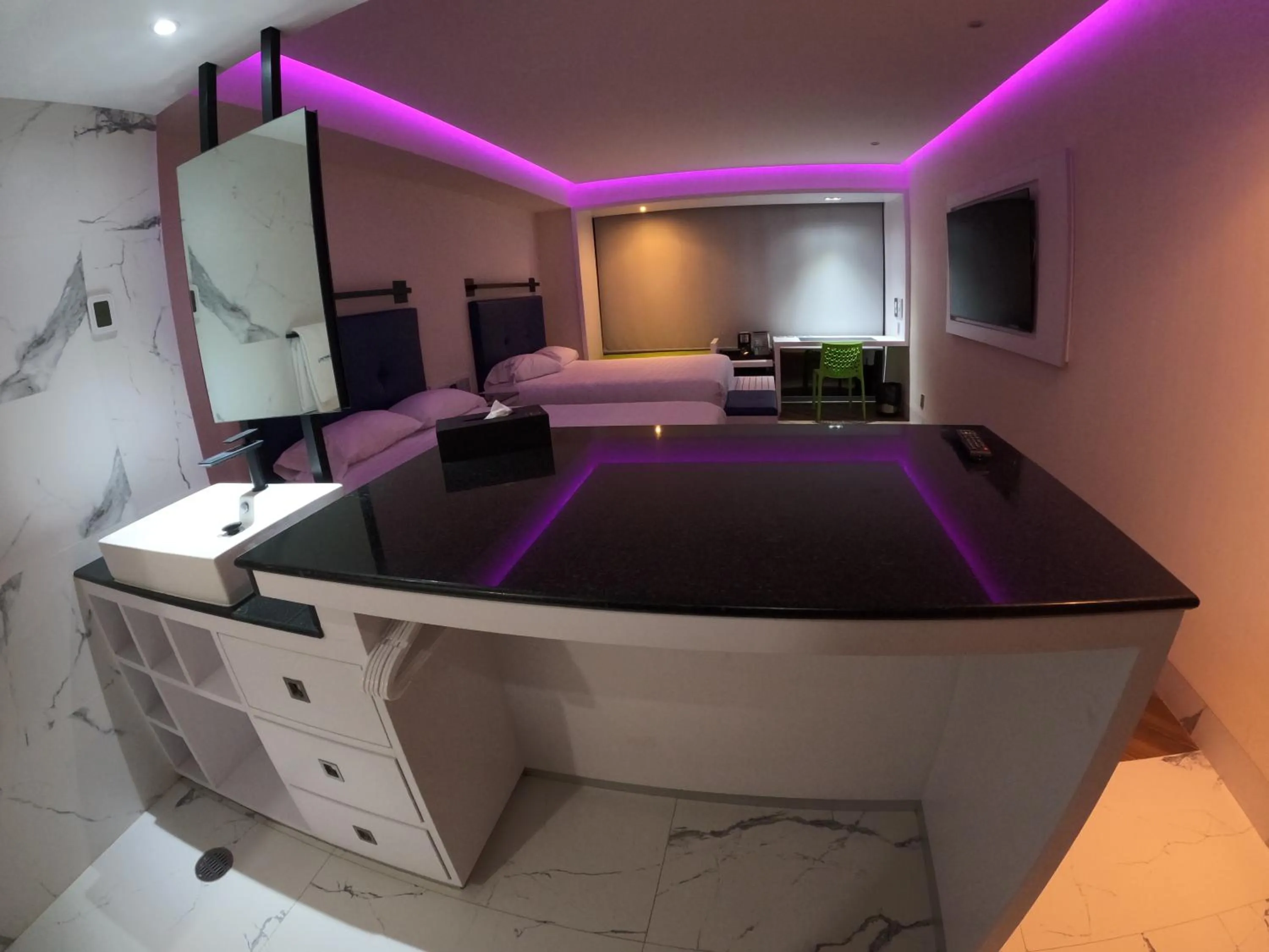 Bedroom, Bed in WeEnjoy Hotels Grand Prix Aeropuerto CDMX