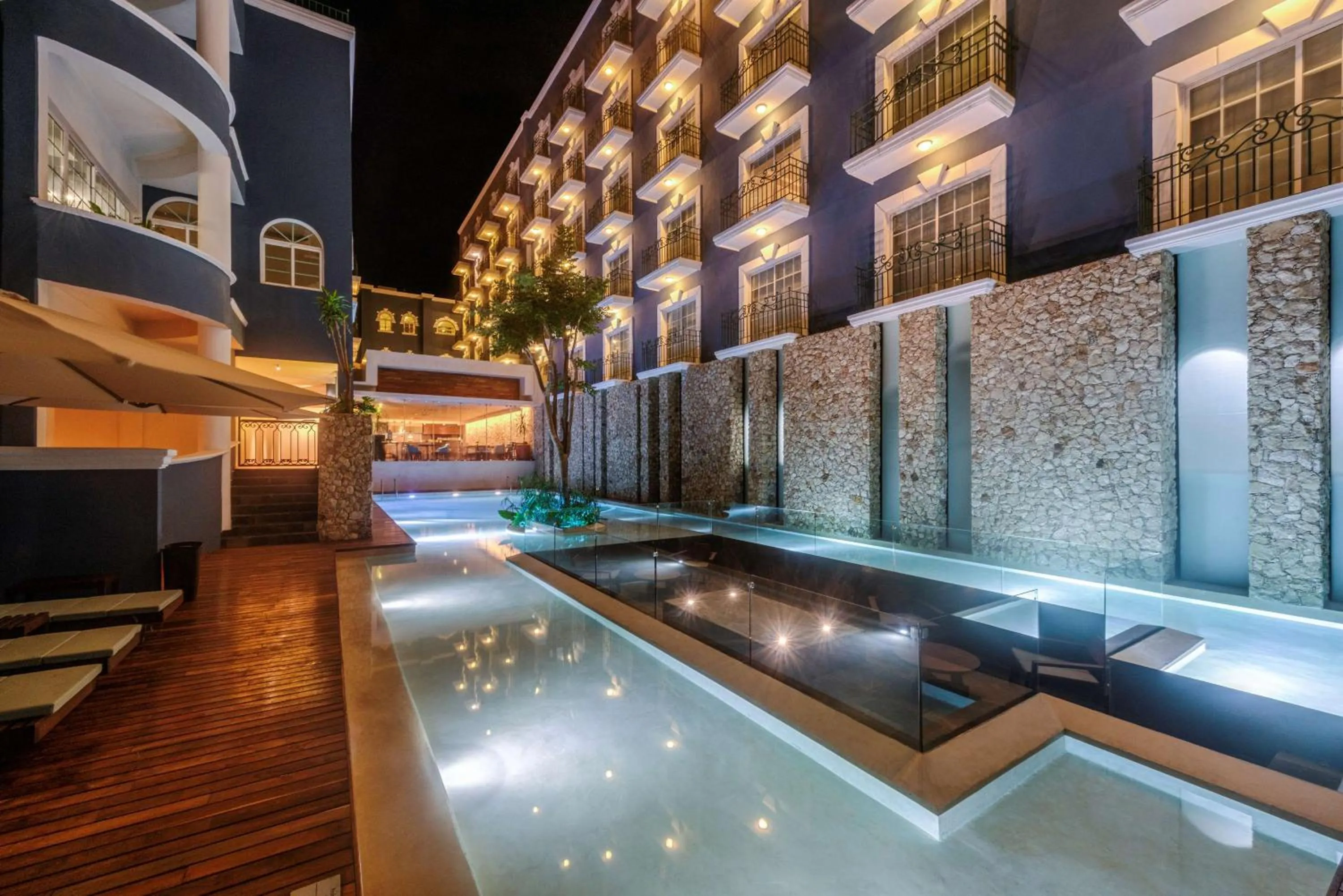 Pool view in Villa Mercedes Curio Collection By Hilton