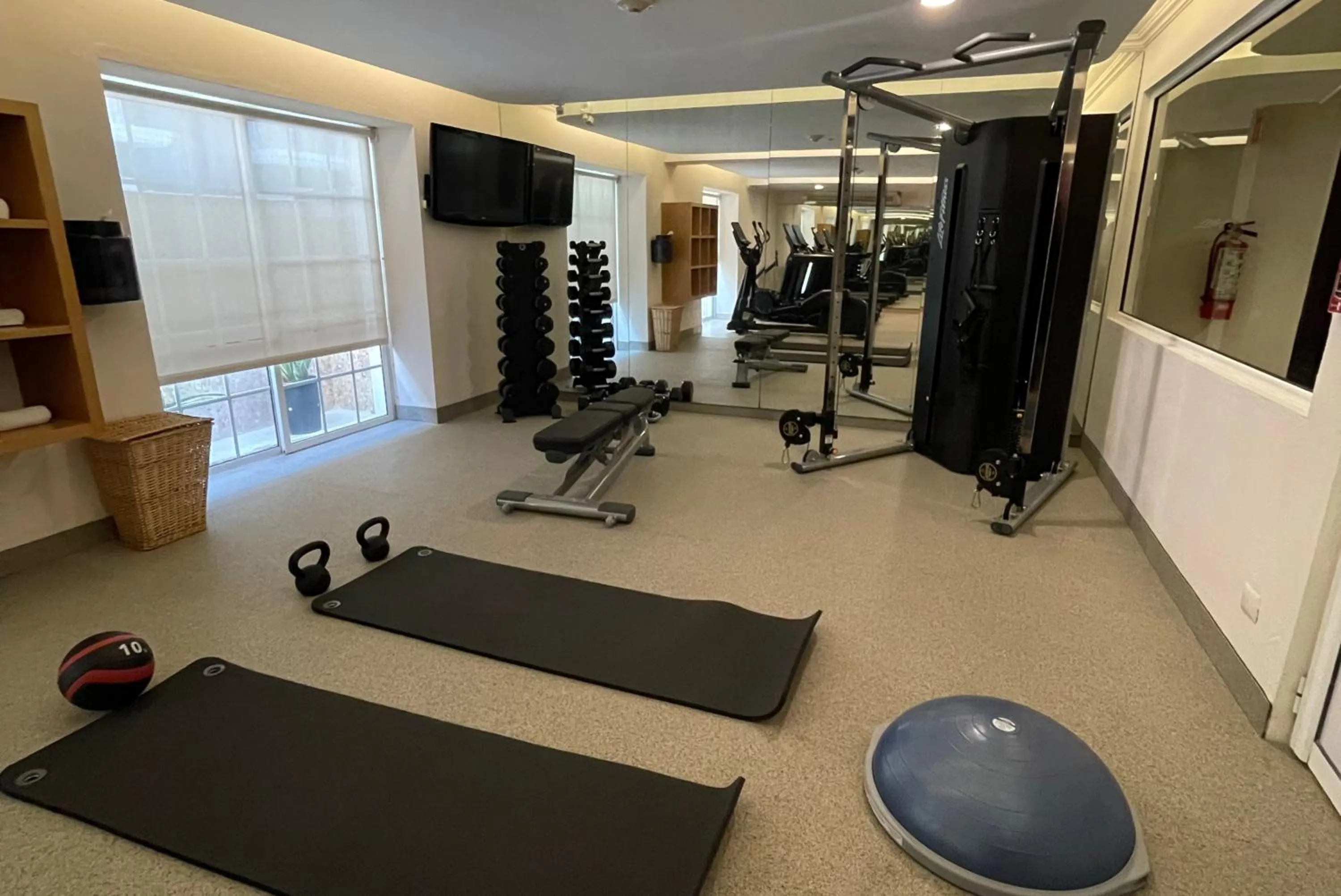 Fitness centre/facilities in Villa Mercedes Curio Collection By Hilton
