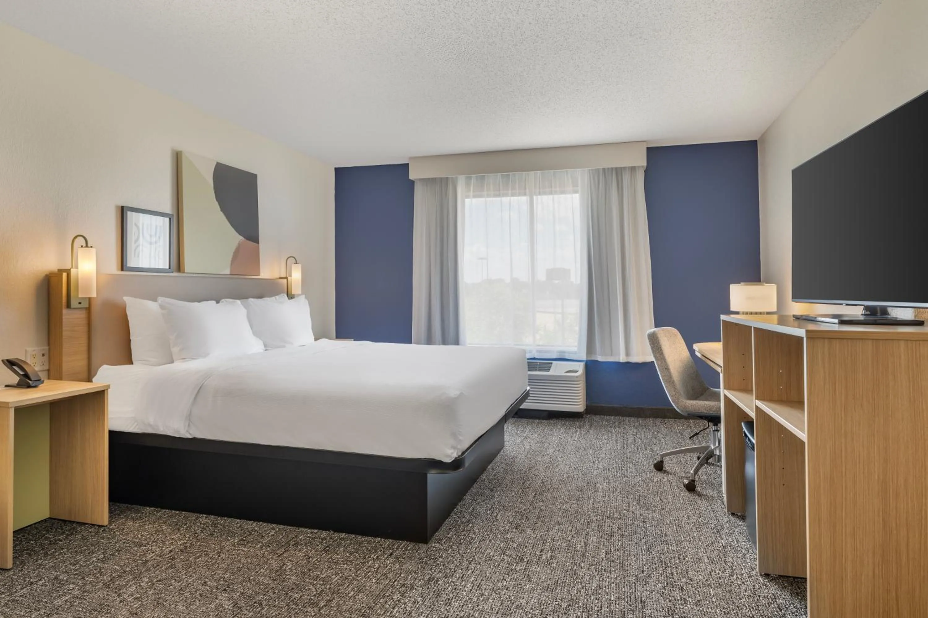 Photo of the whole room, Bed in Spark by Hilton La Crosse Onalaska