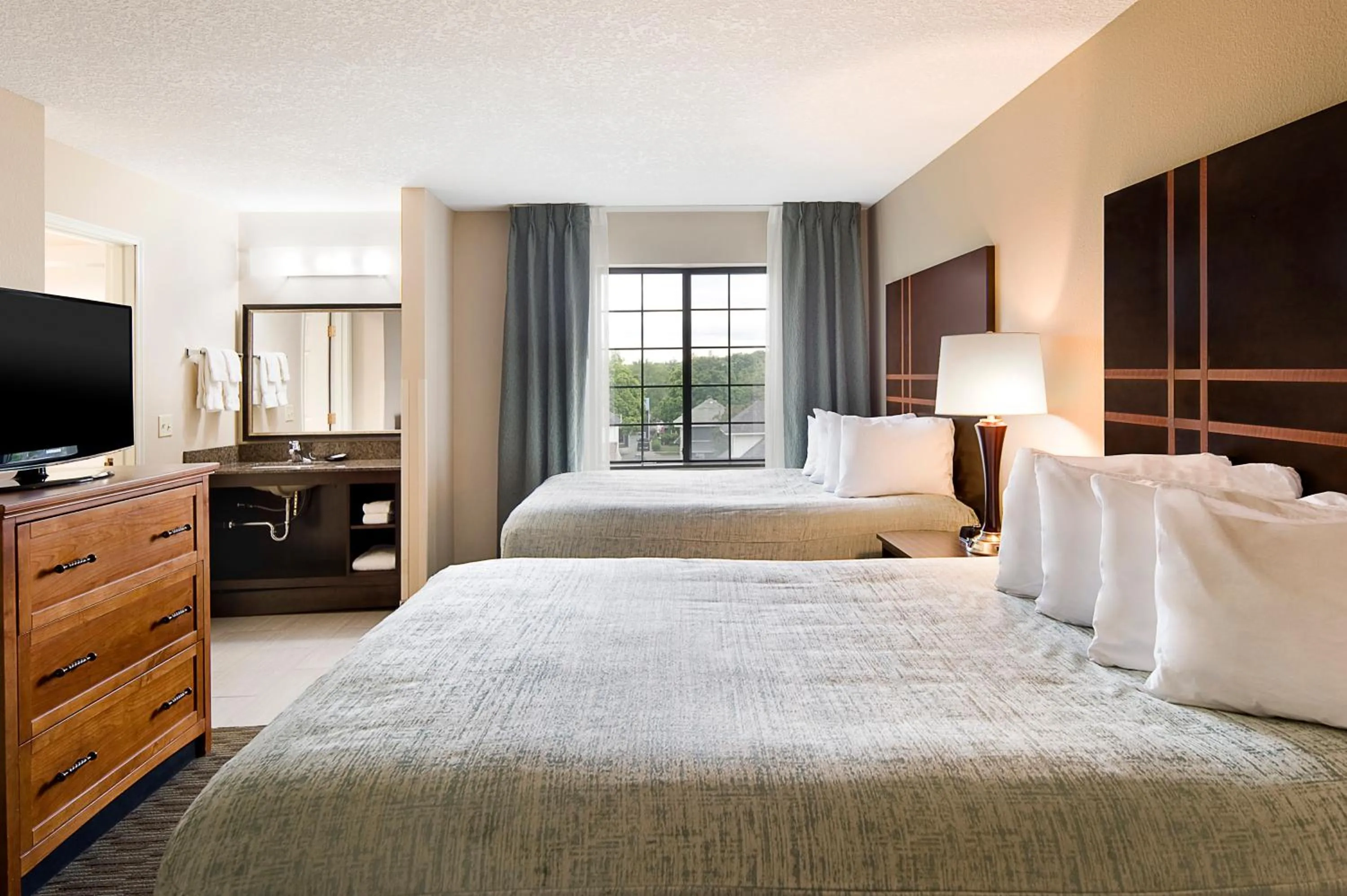 Bed in Aspen Suites - Rochester