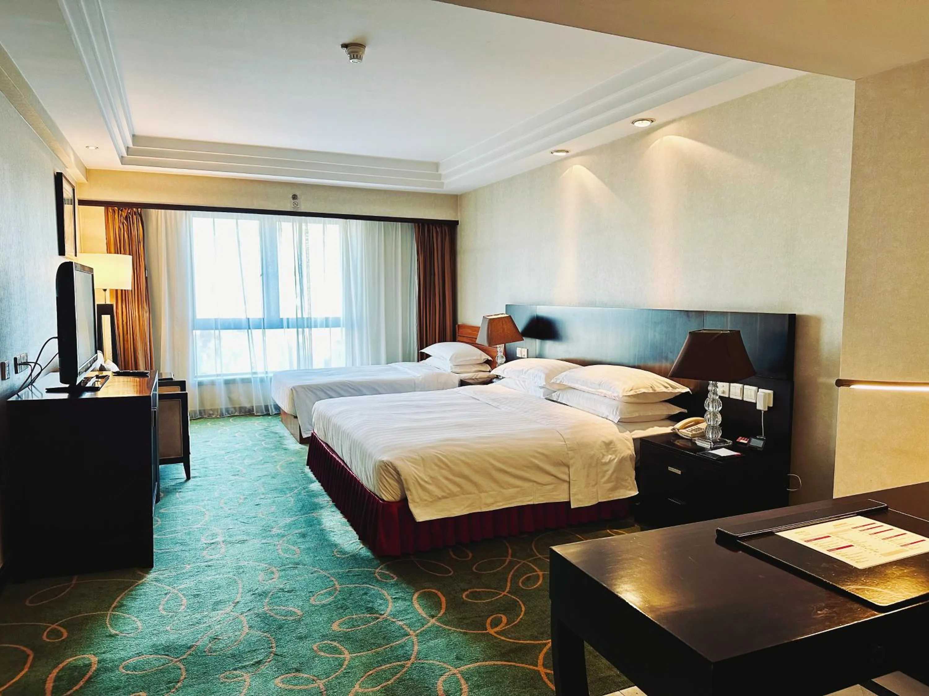 Bed in Guo Ji Yi Yuan Hotel