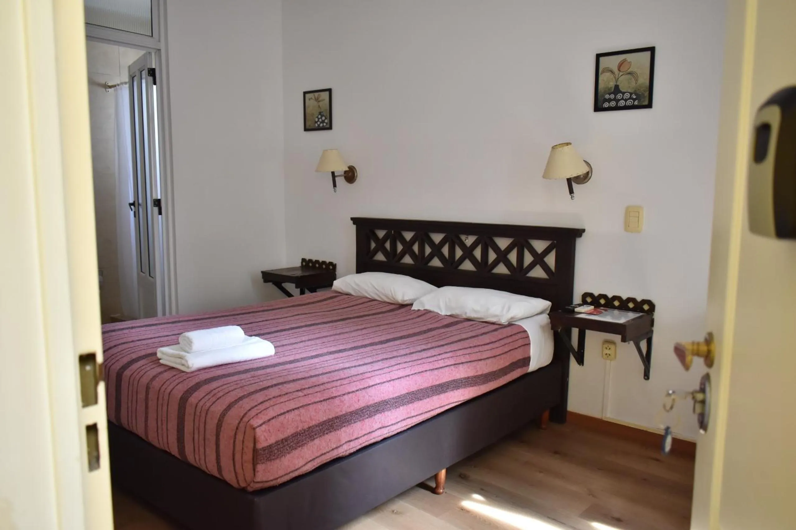 Bed in Hotel Frossard