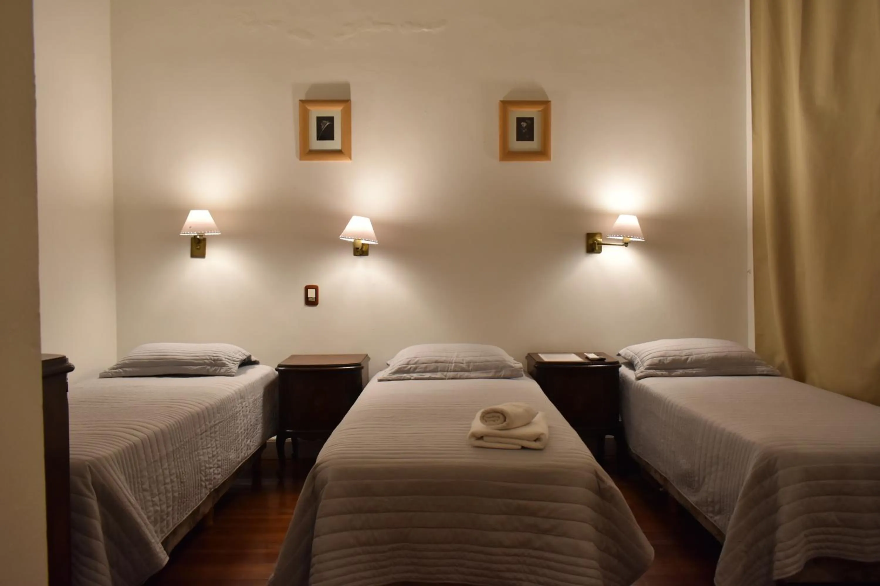 Bed in Hotel Frossard