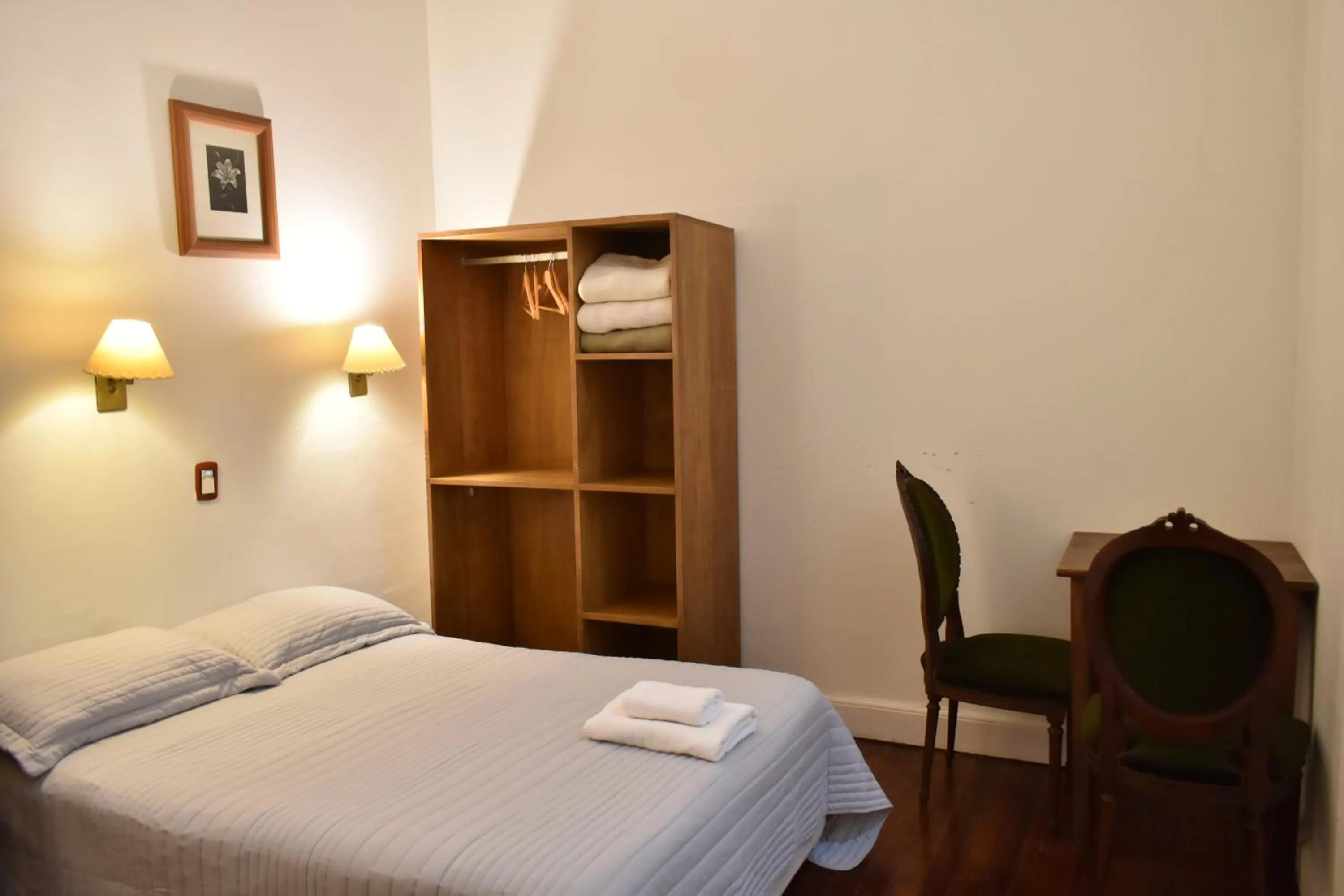 Bed in Hotel Frossard