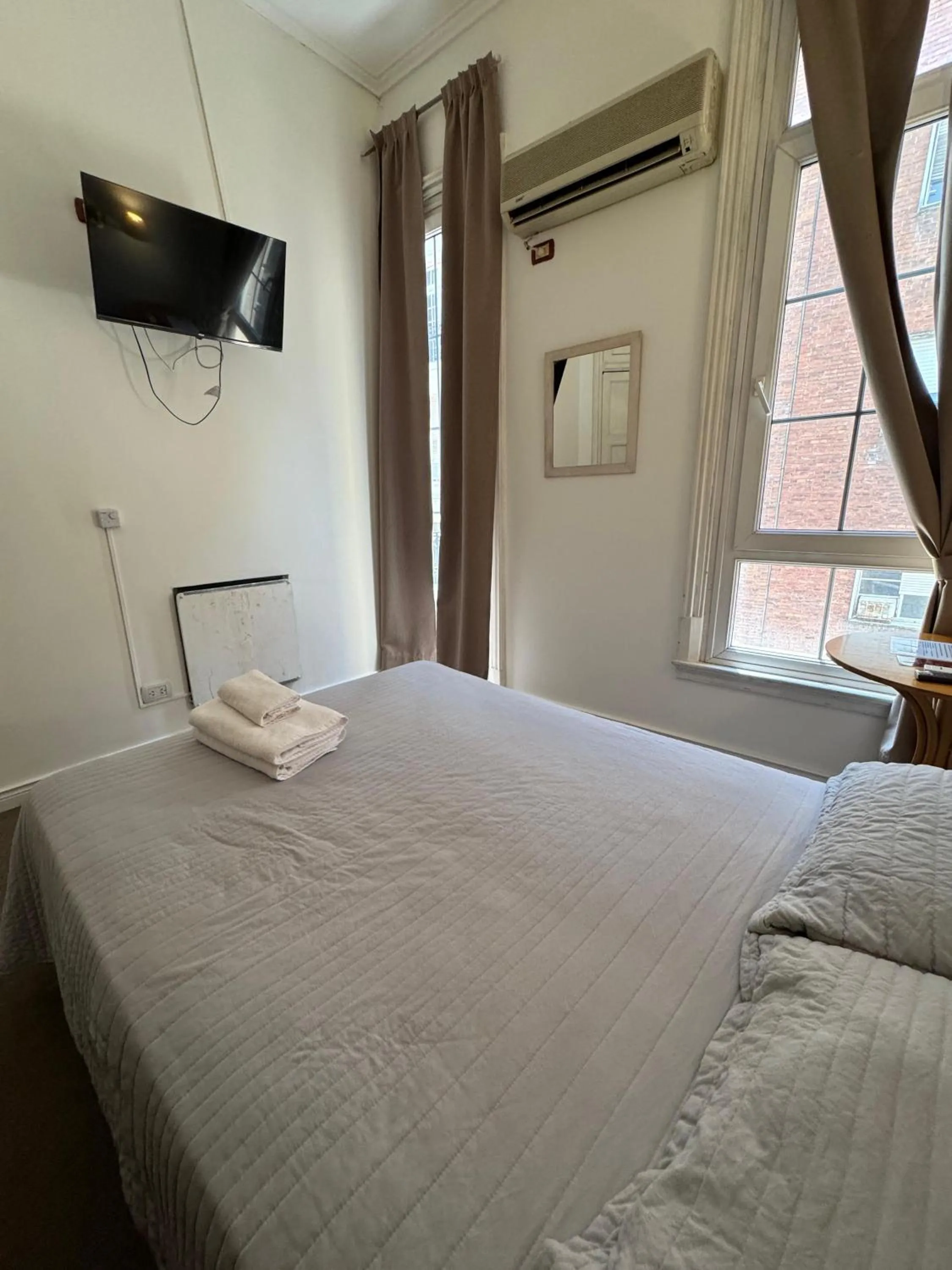 Bed in Hotel Frossard