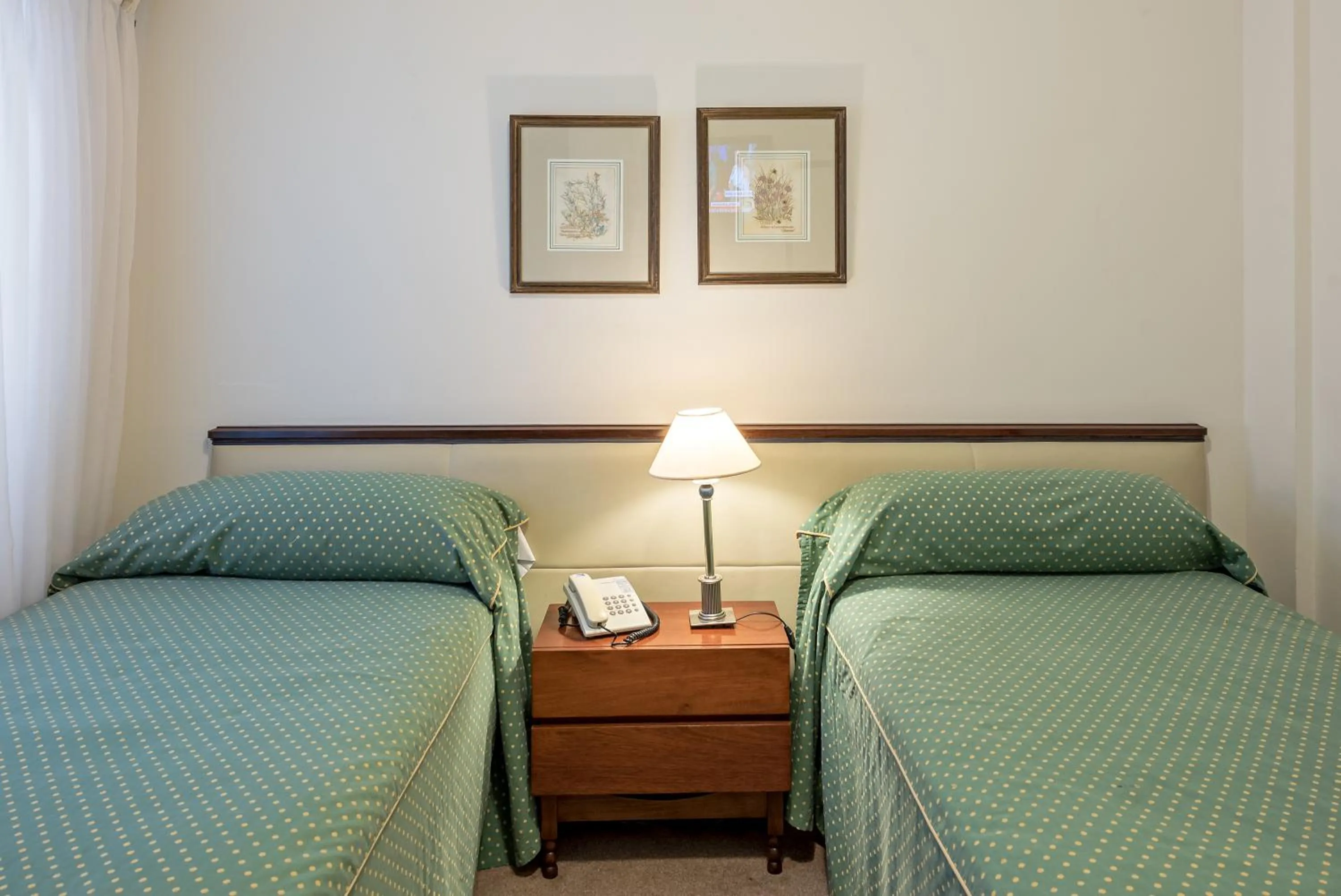 Bed in Hotel Presidente