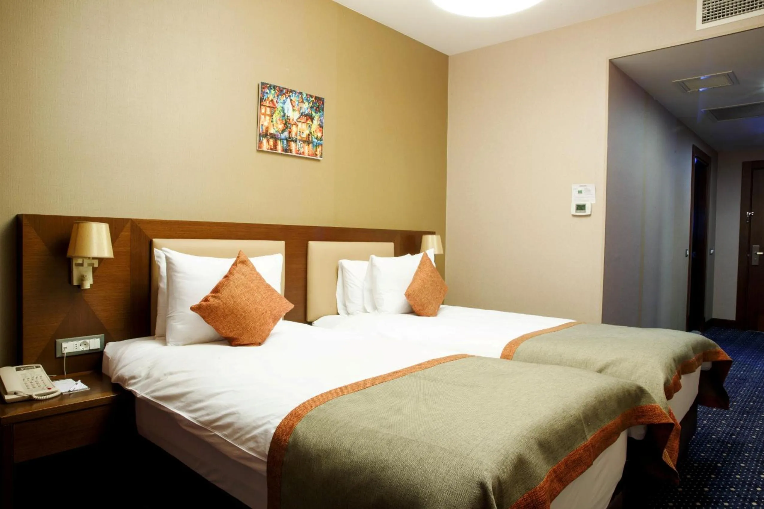 Bed in Parkside Hotel & Apartments