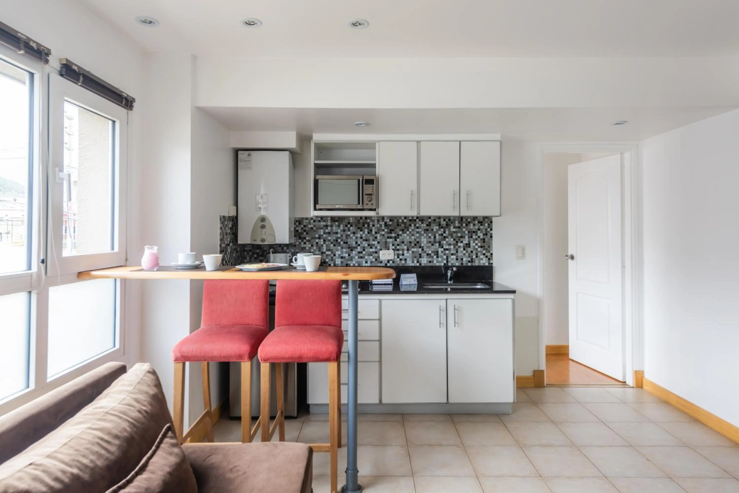 Kitchen or kitchenette in Cilene del Faro Suites & Spa