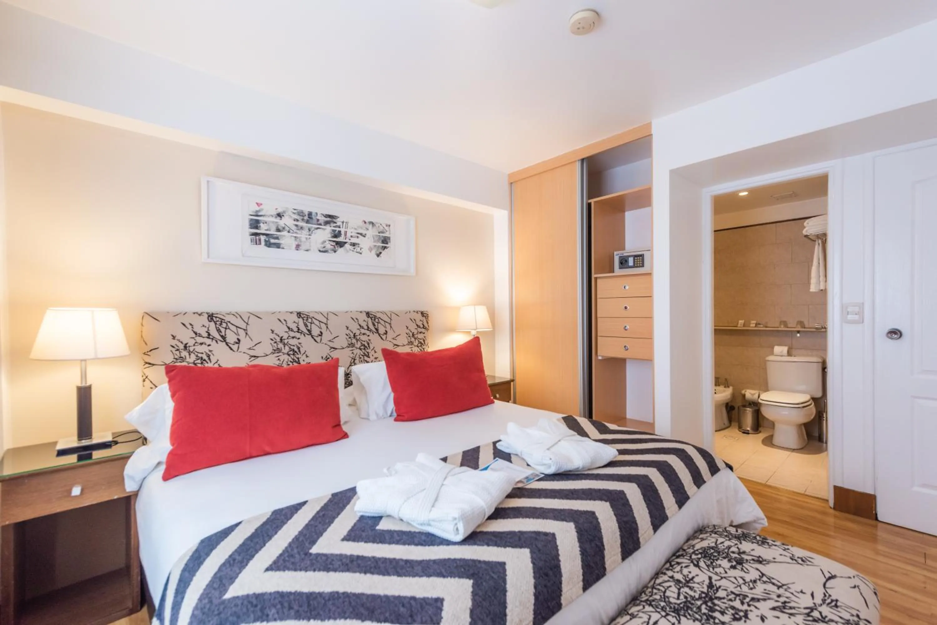 Bed in Cilene del Faro Suites & Spa