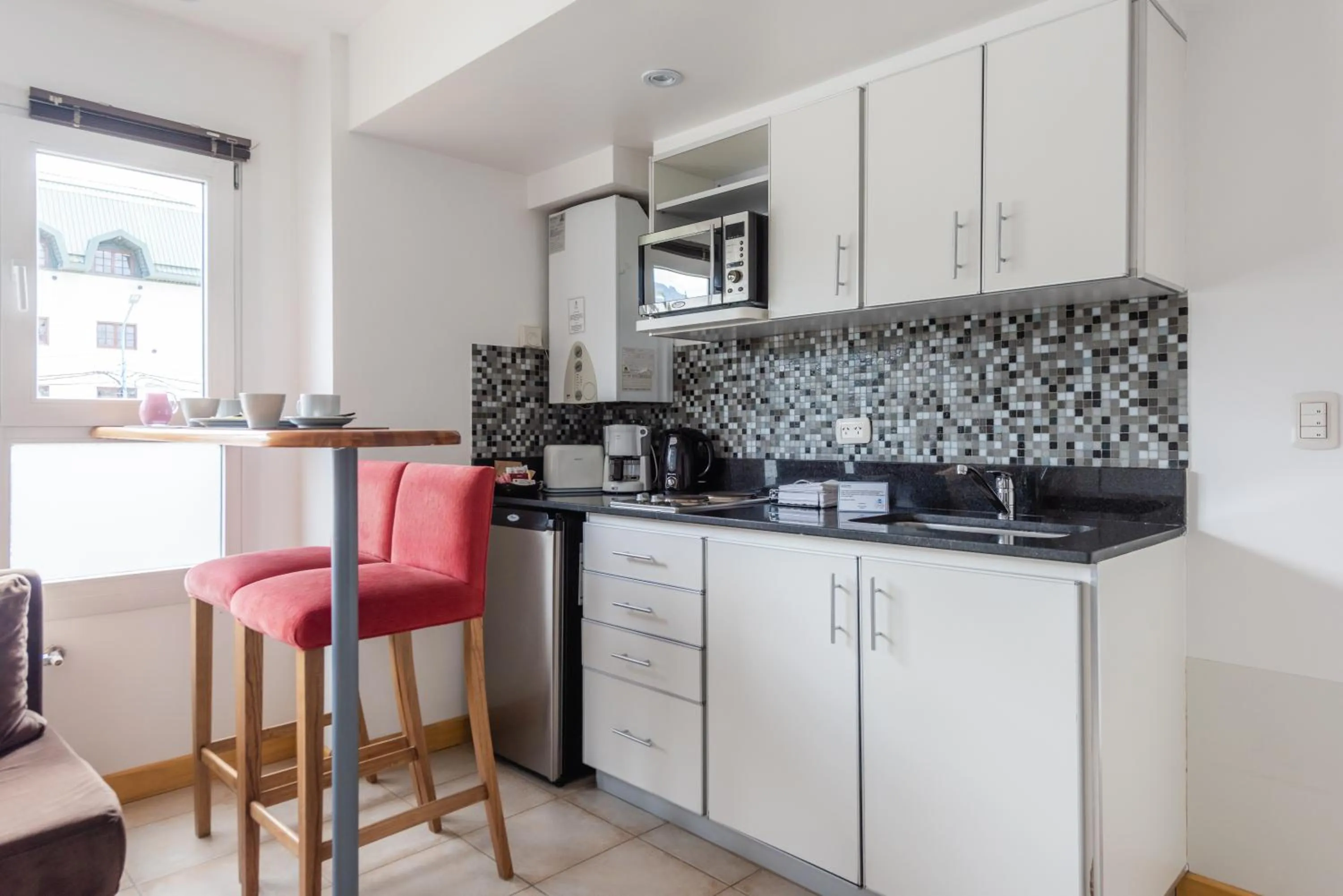 Kitchen or kitchenette in Cilene del Faro Suites & Spa