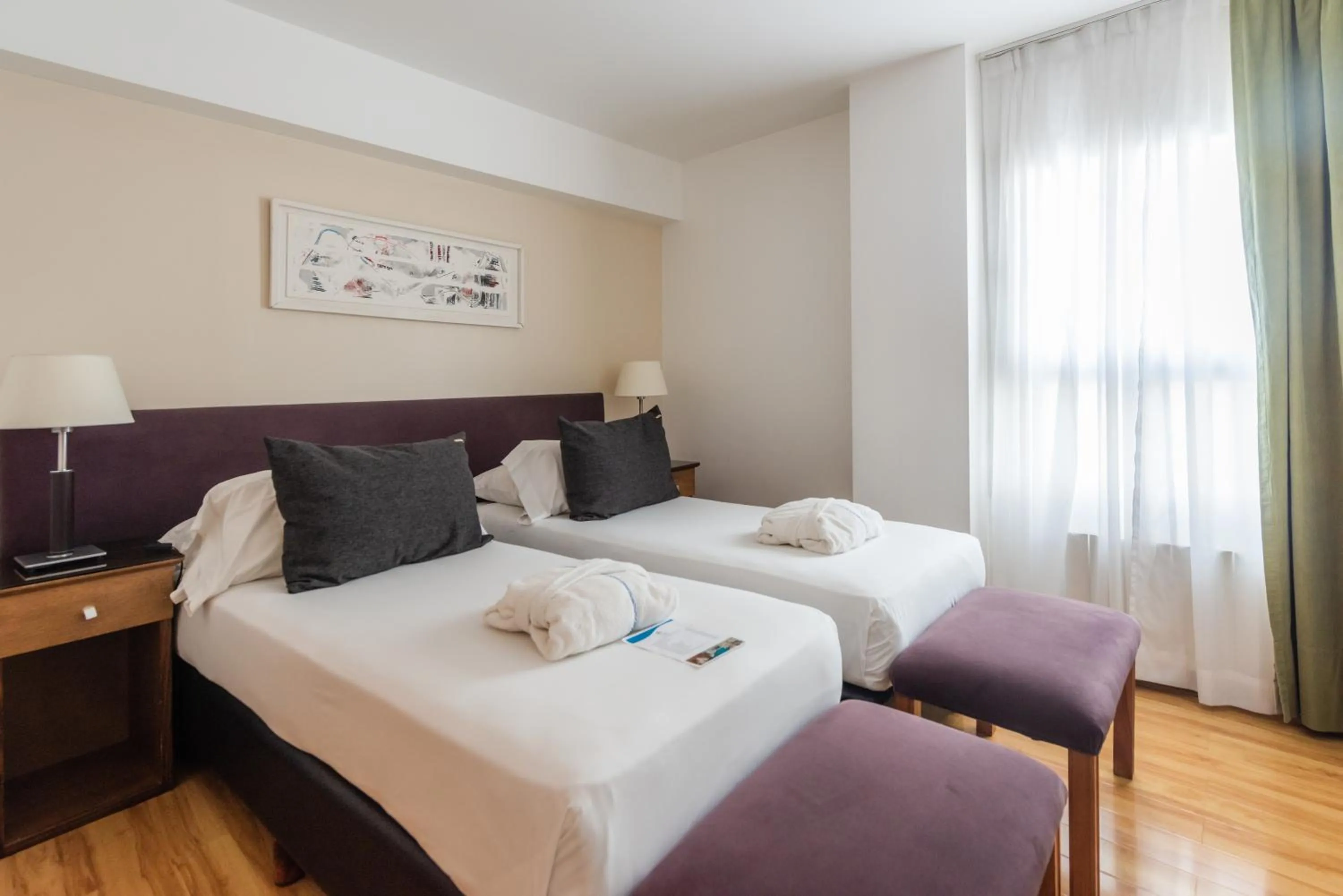 Bed in Cilene del Faro Suites & Spa