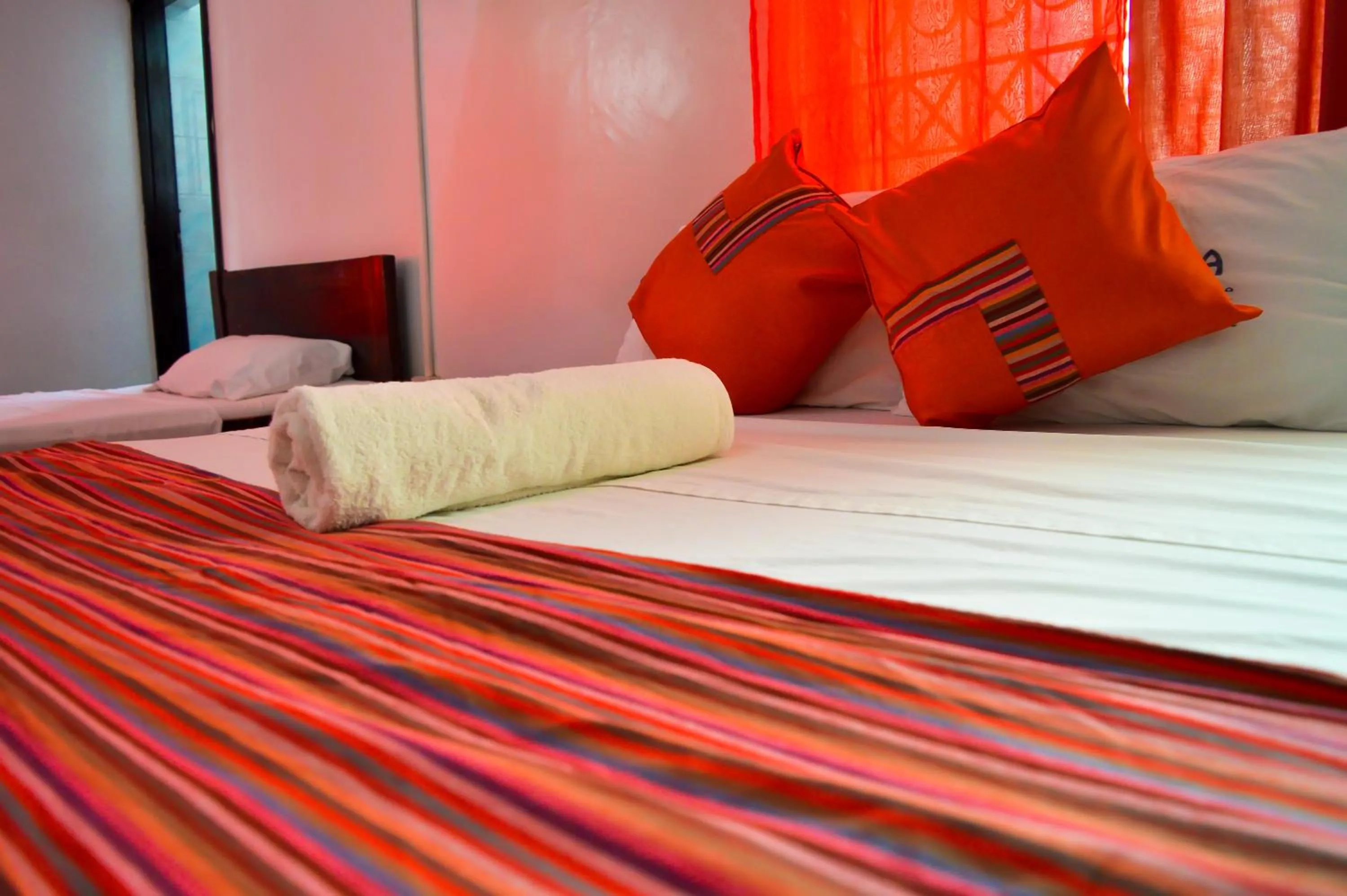 Bed in Sanana Conference Center and Holiday Resort