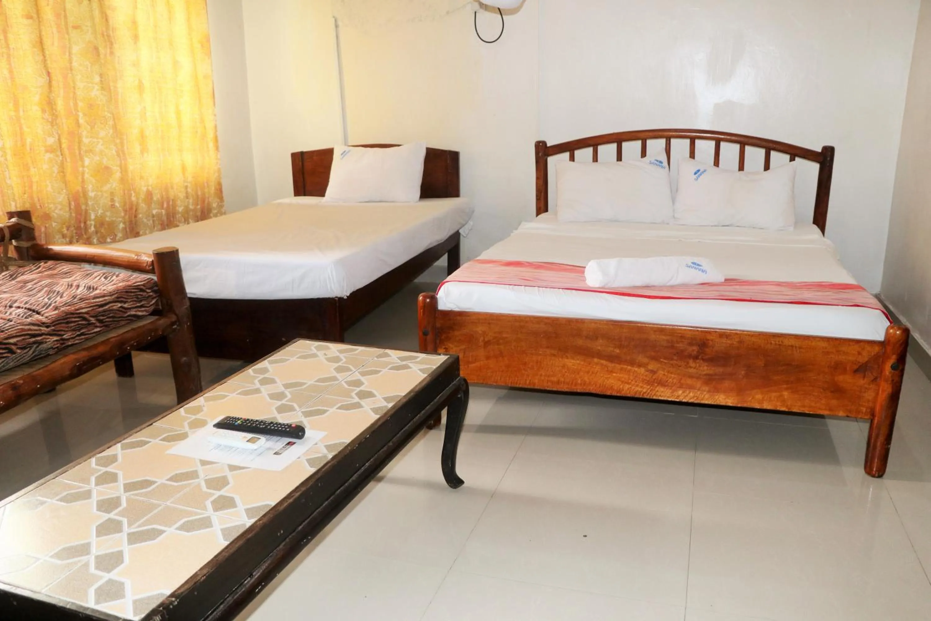 Bed in Sanana Conference Center and Holiday Resort
