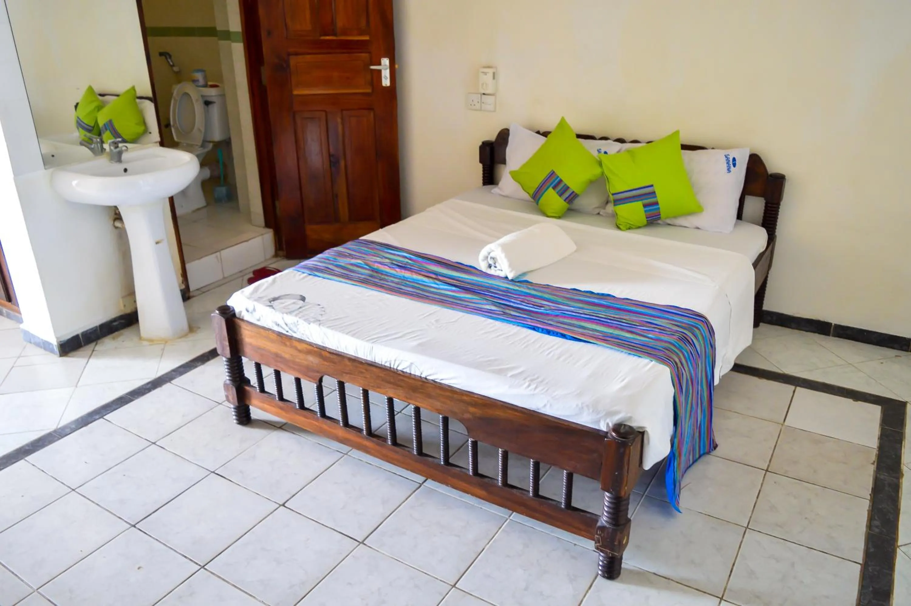 Bed in Sanana Conference Center and Holiday Resort