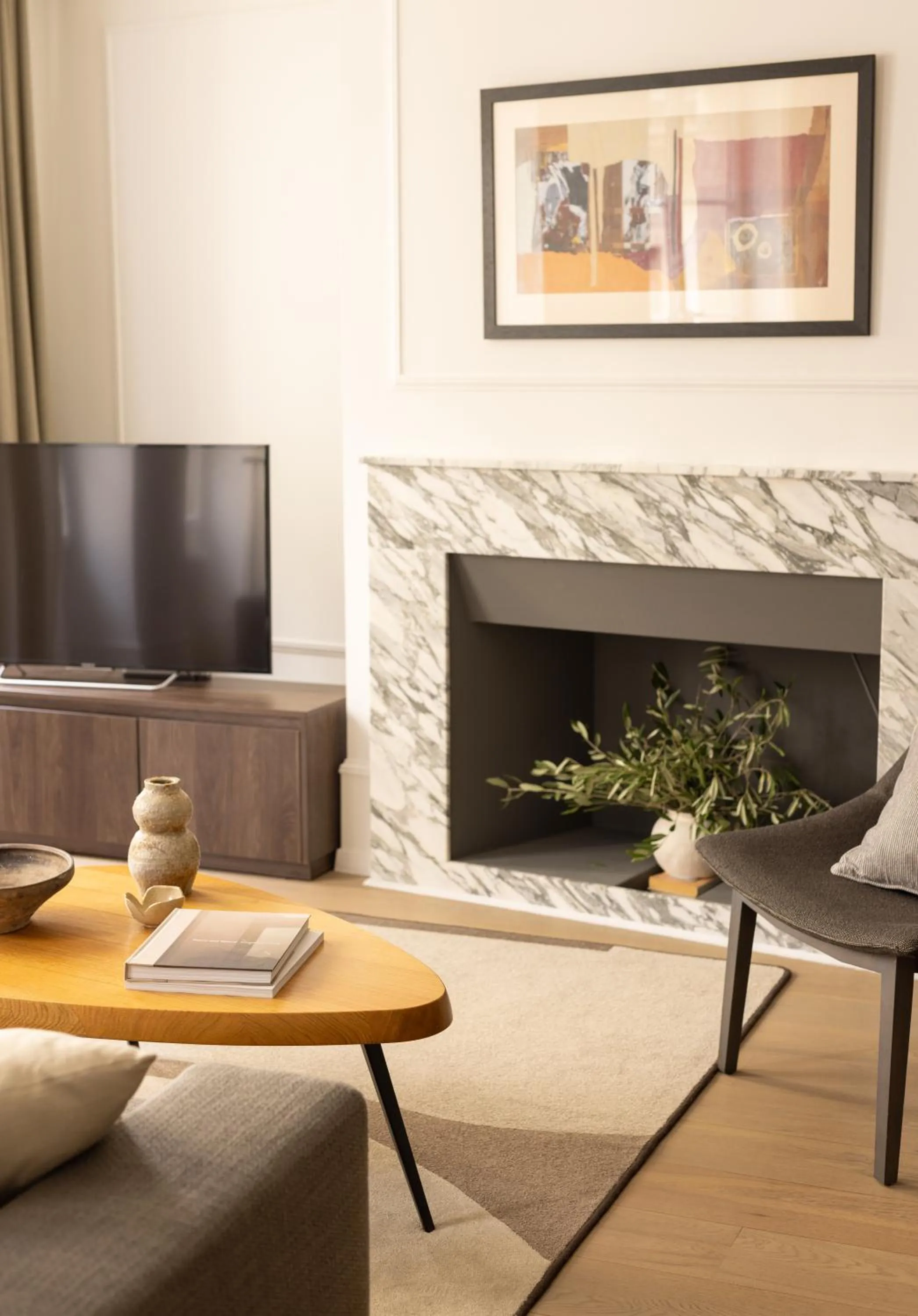 Communal lounge/ TV room in The Hamlet - Luxury Serviced Apartments