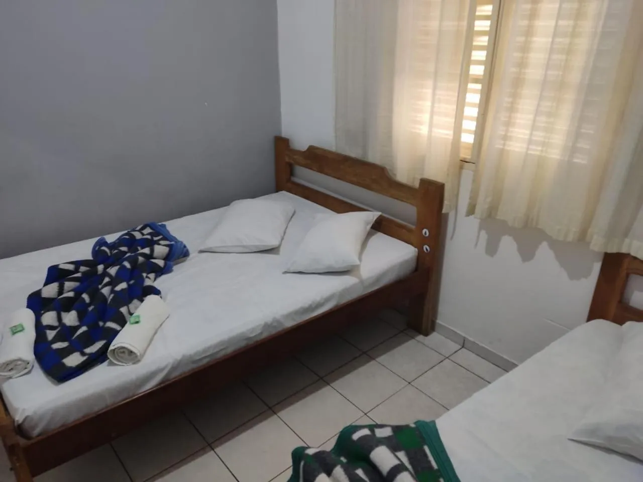 Bed in Hotel São Luiz