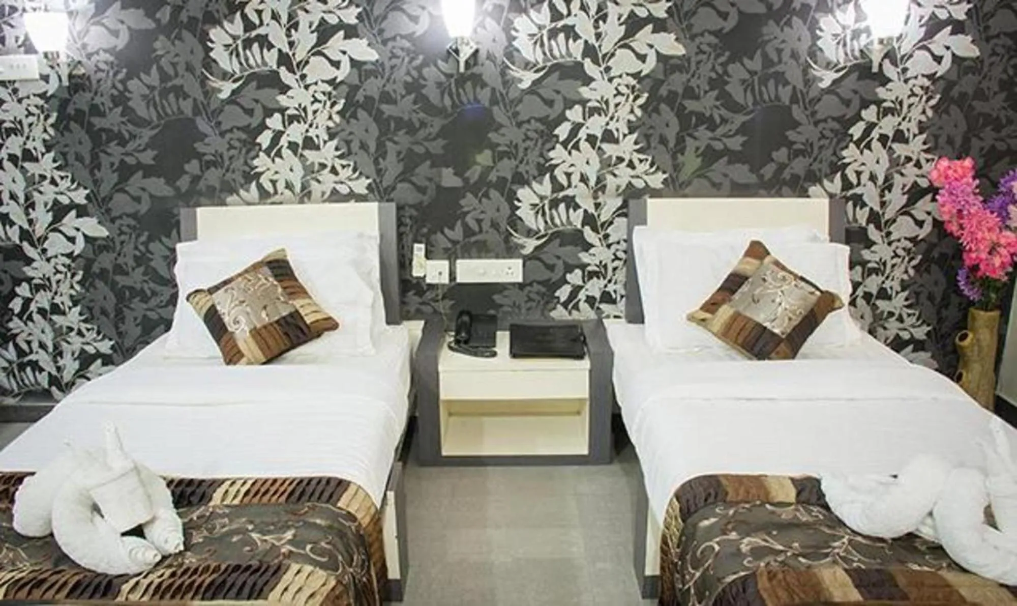 Bed in Vora Corporate Inn