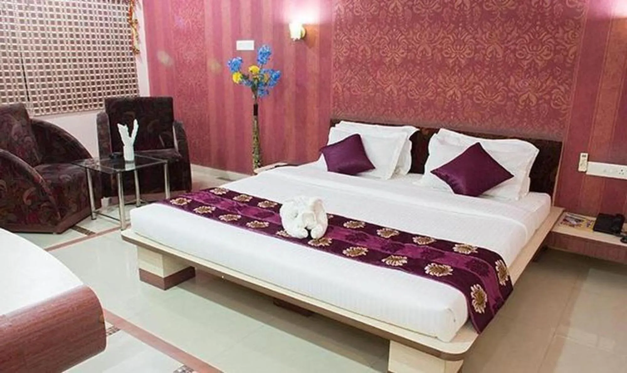 Bed in Vora Corporate Inn