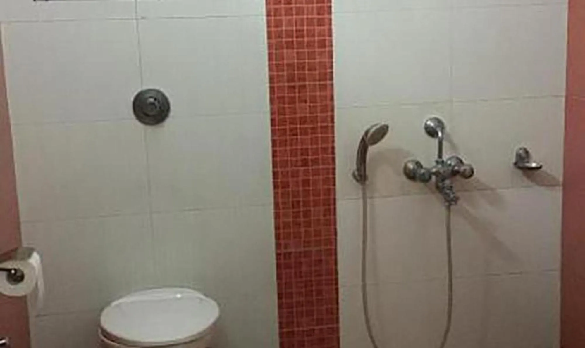 Toilet in Vora Corporate Inn
