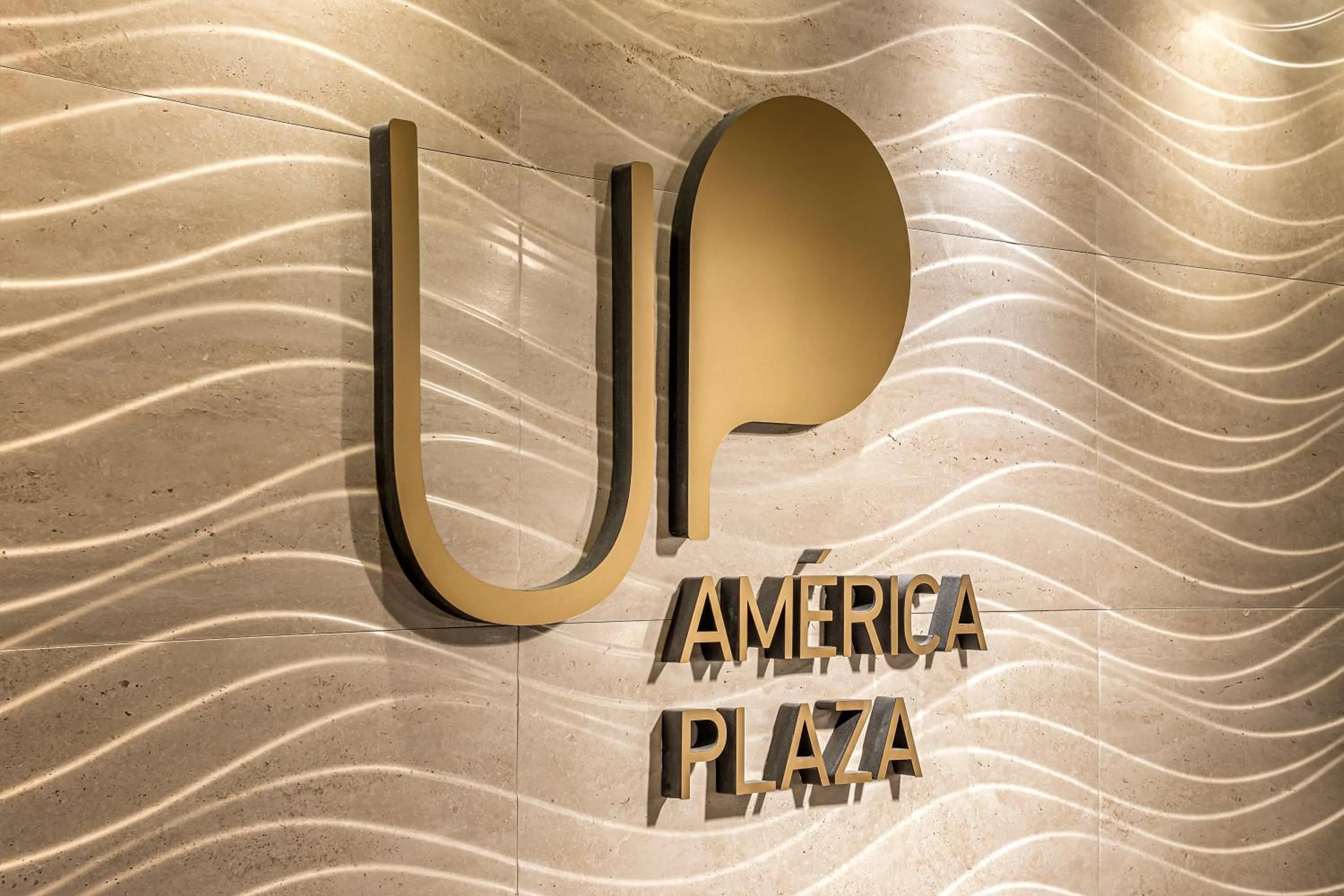 Property logo or sign in Up América Plaza