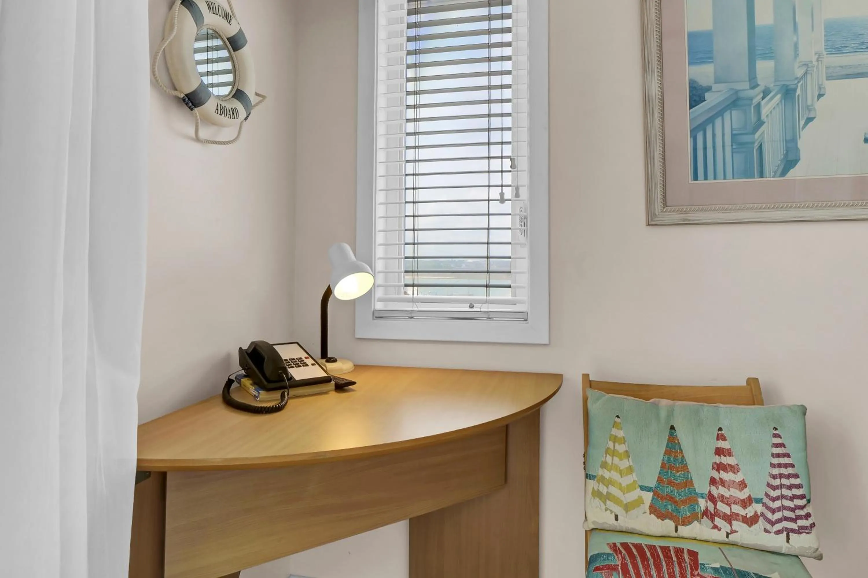 Bedroom in Sandpeddler Inn and Suites