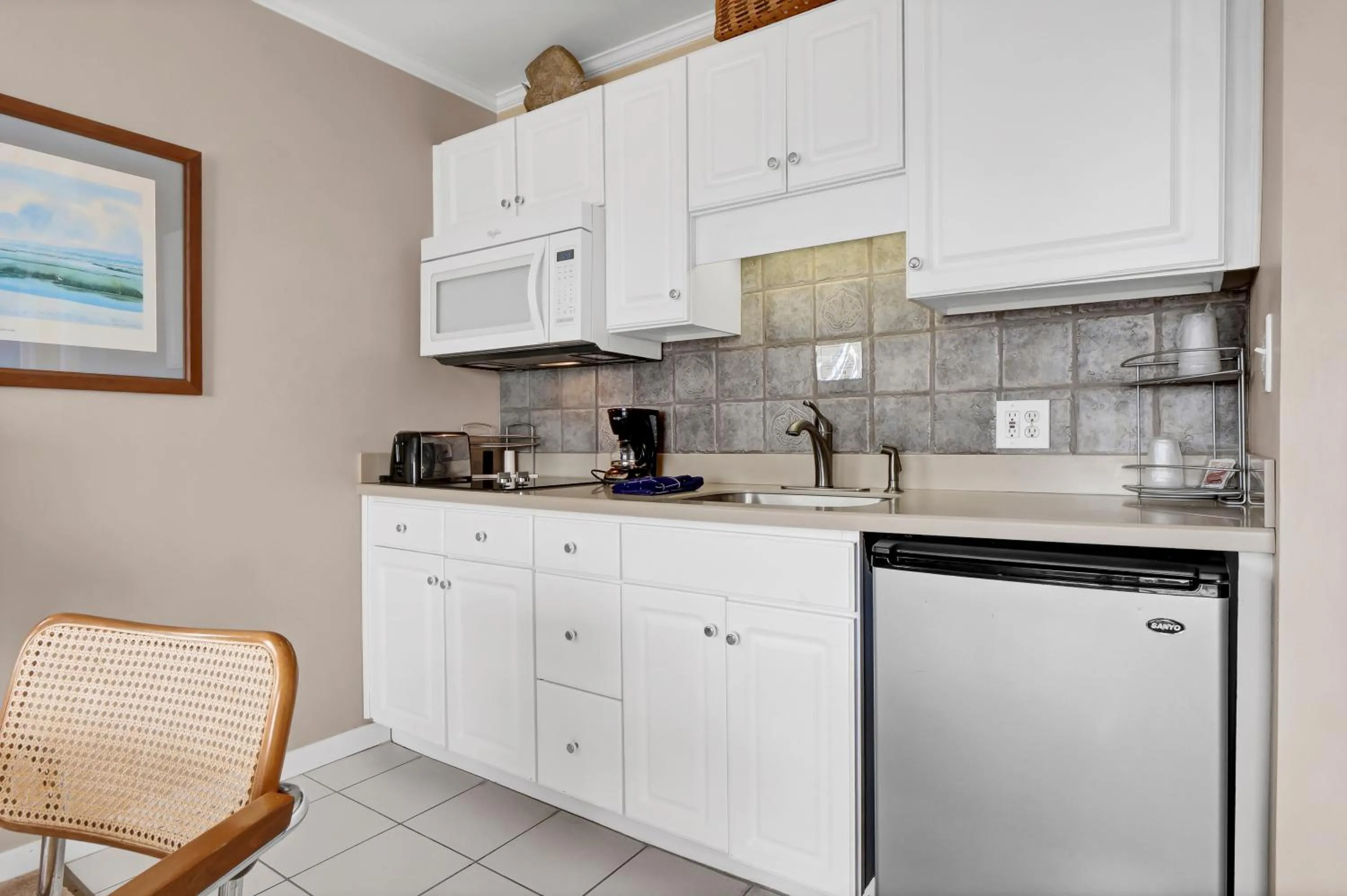 Kitchen or kitchenette in Sandpeddler Inn and Suites