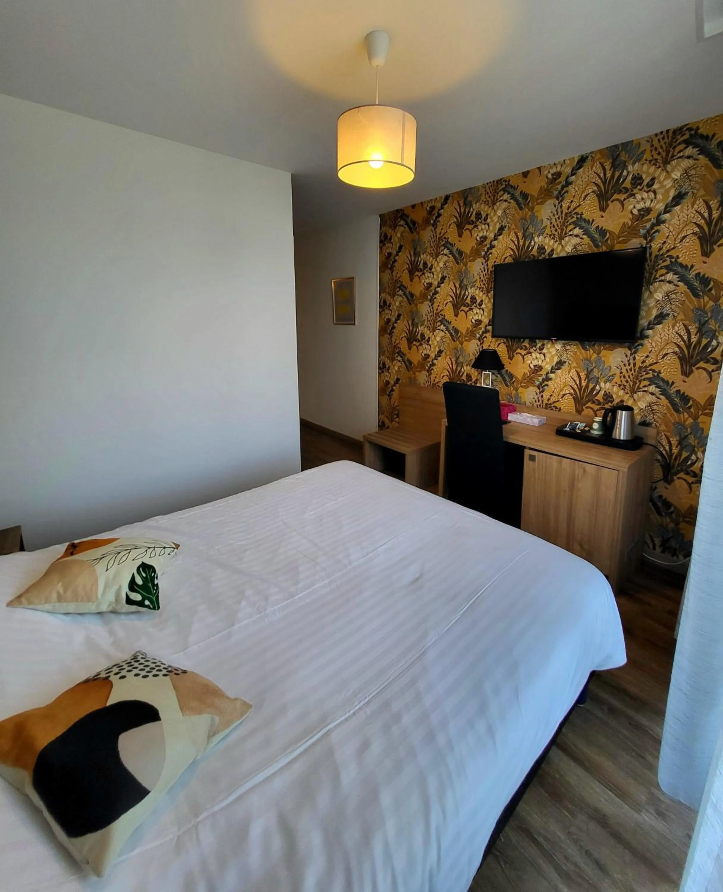 Bed in Le Grand Hôtel Molière