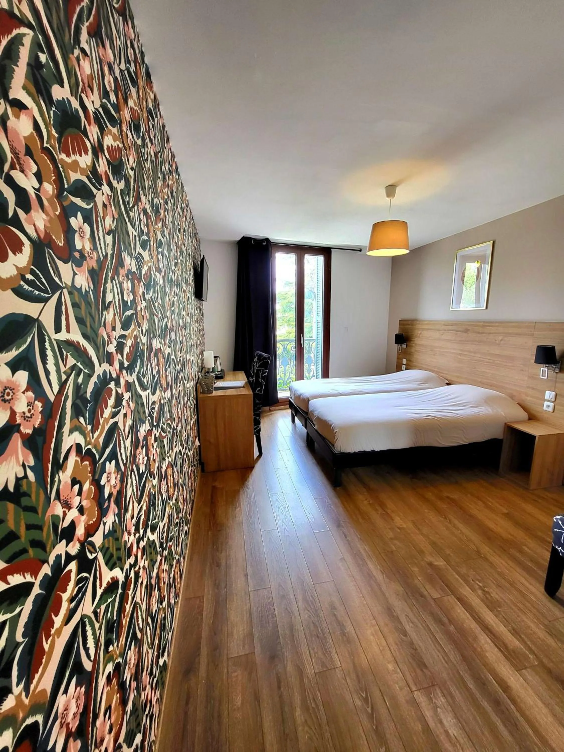 Bed in Le Grand Hôtel Molière