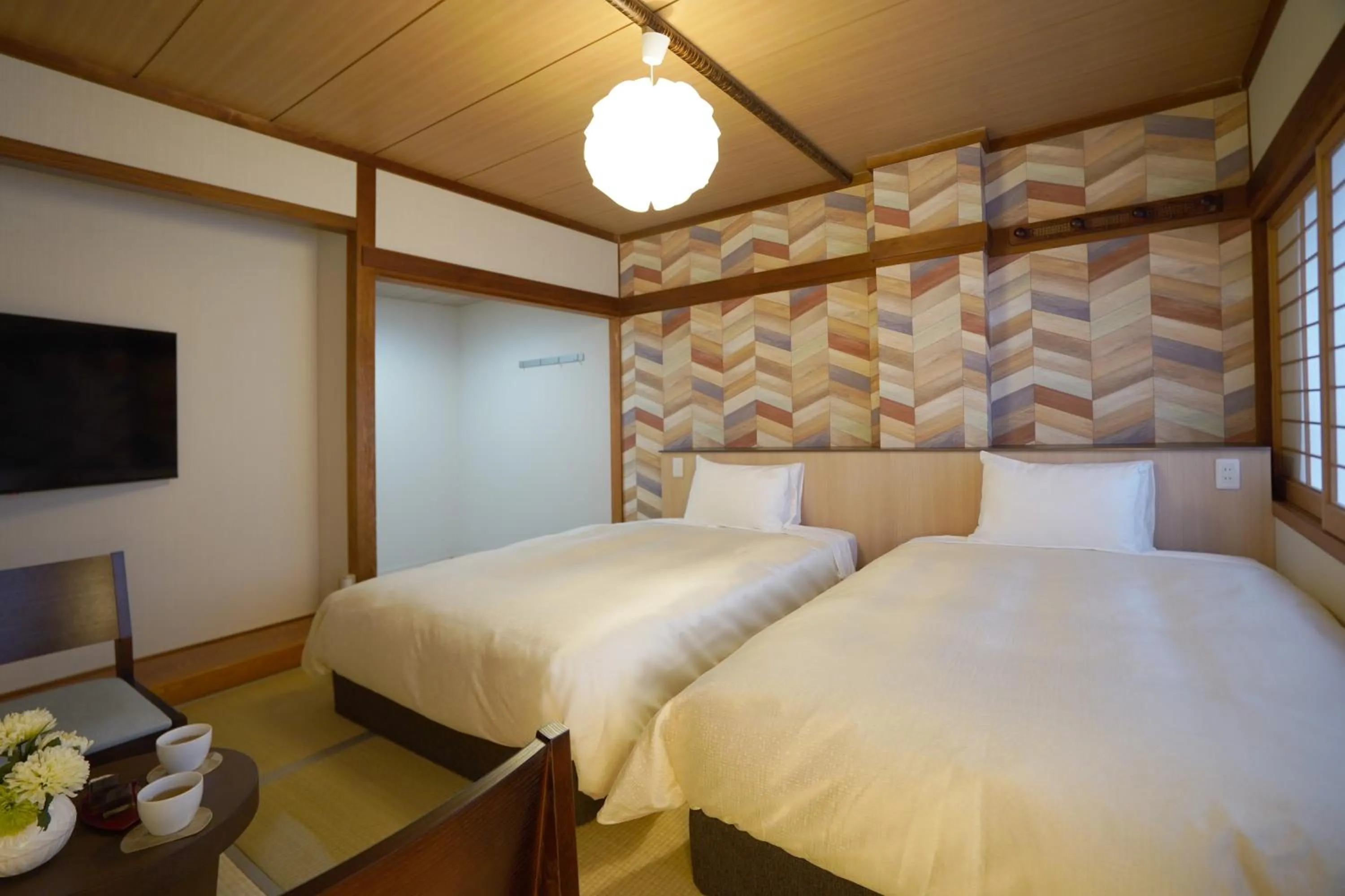 Bed in Hotel New Gaea Iizuka