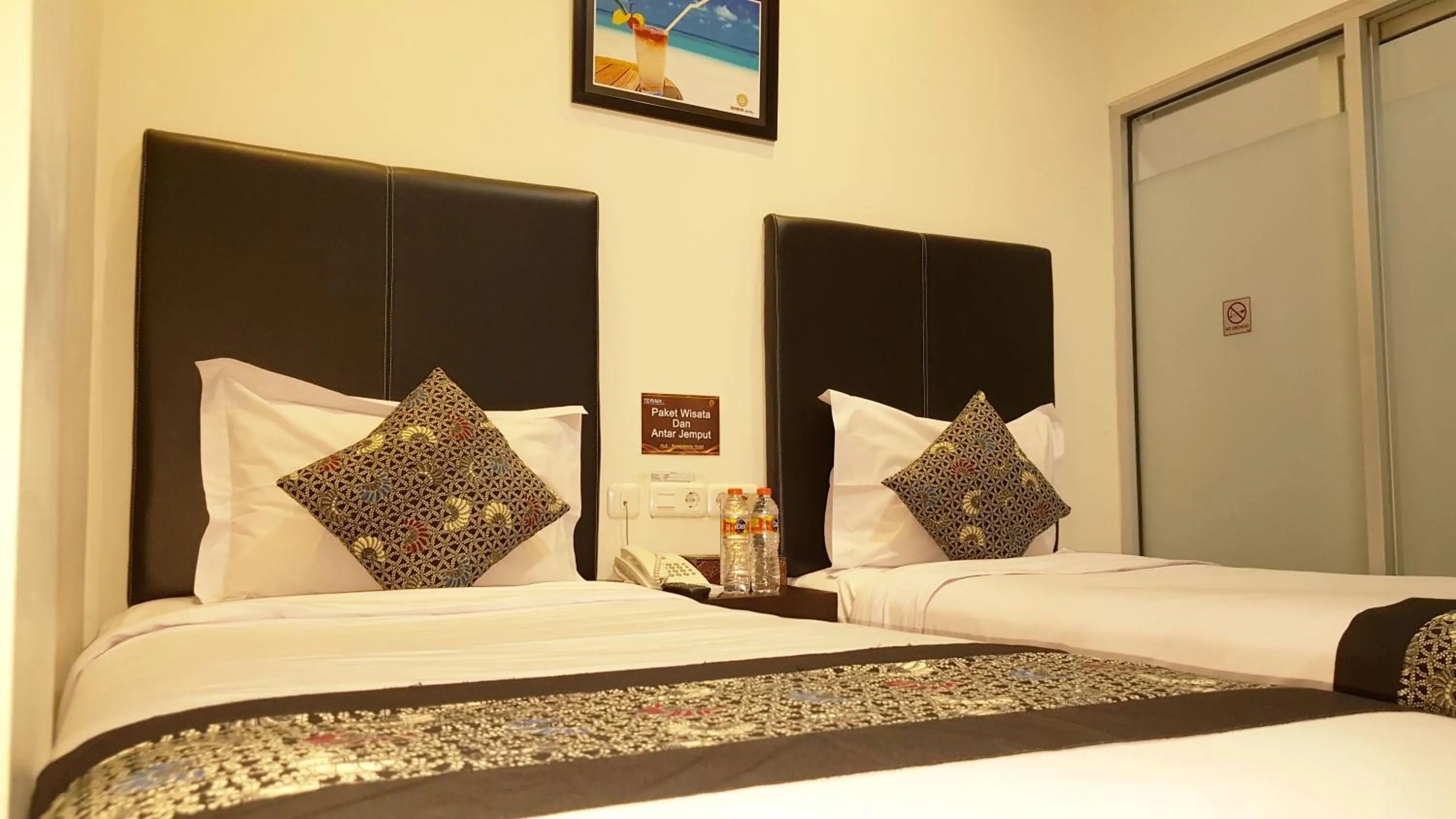 Bed in Sunrise Hotel Jombor Jogja