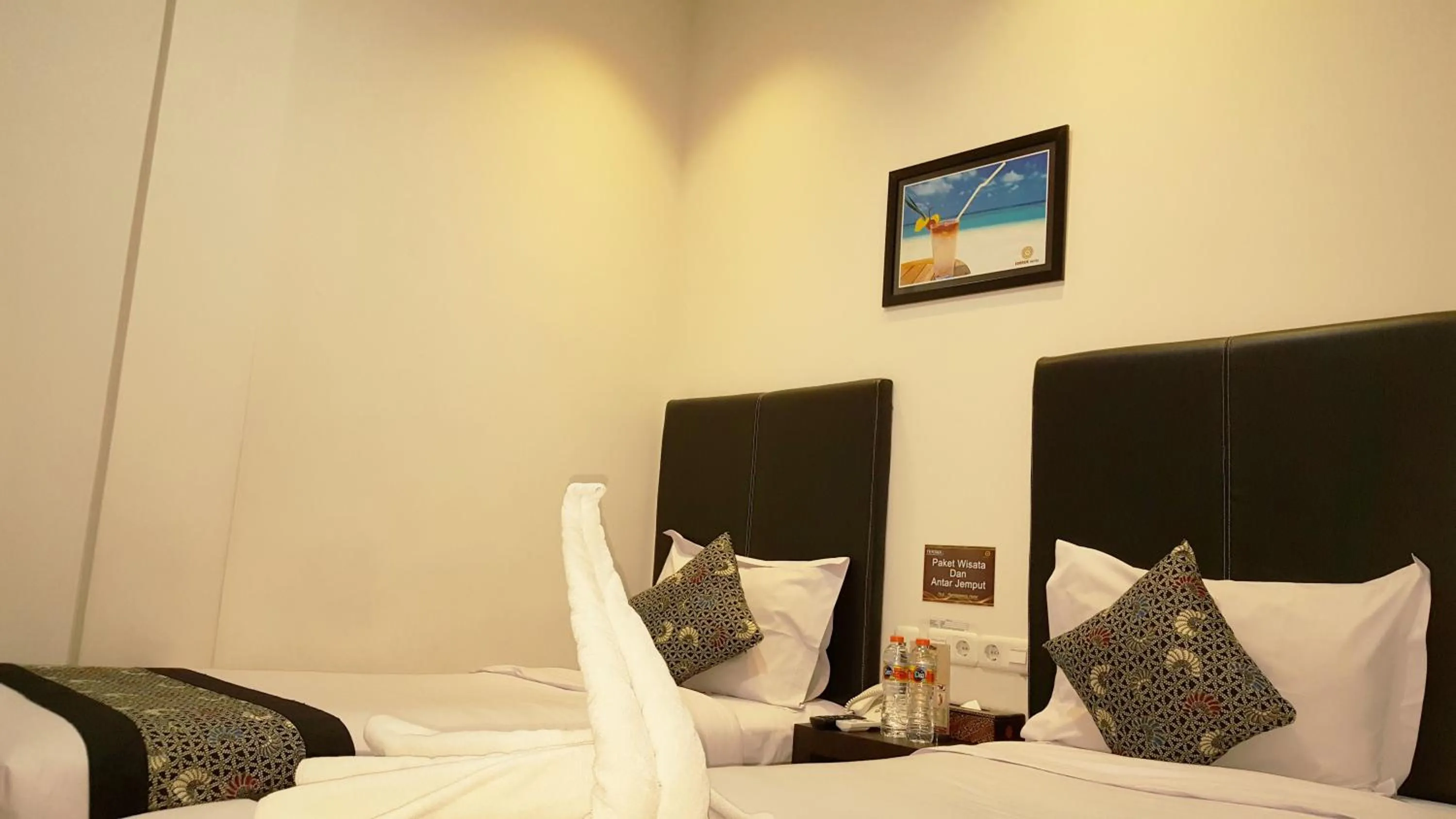 Bed in Sunrise Hotel Jombor Jogja