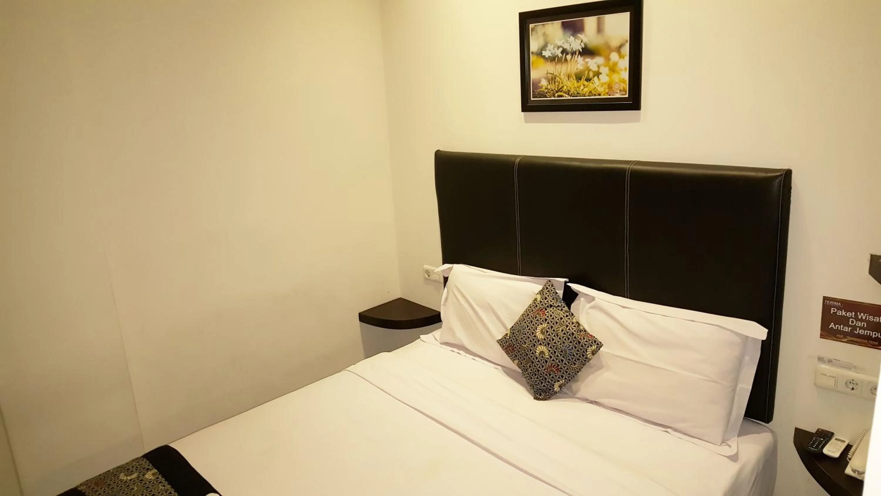 Bed in Sunrise Hotel Jombor Jogja