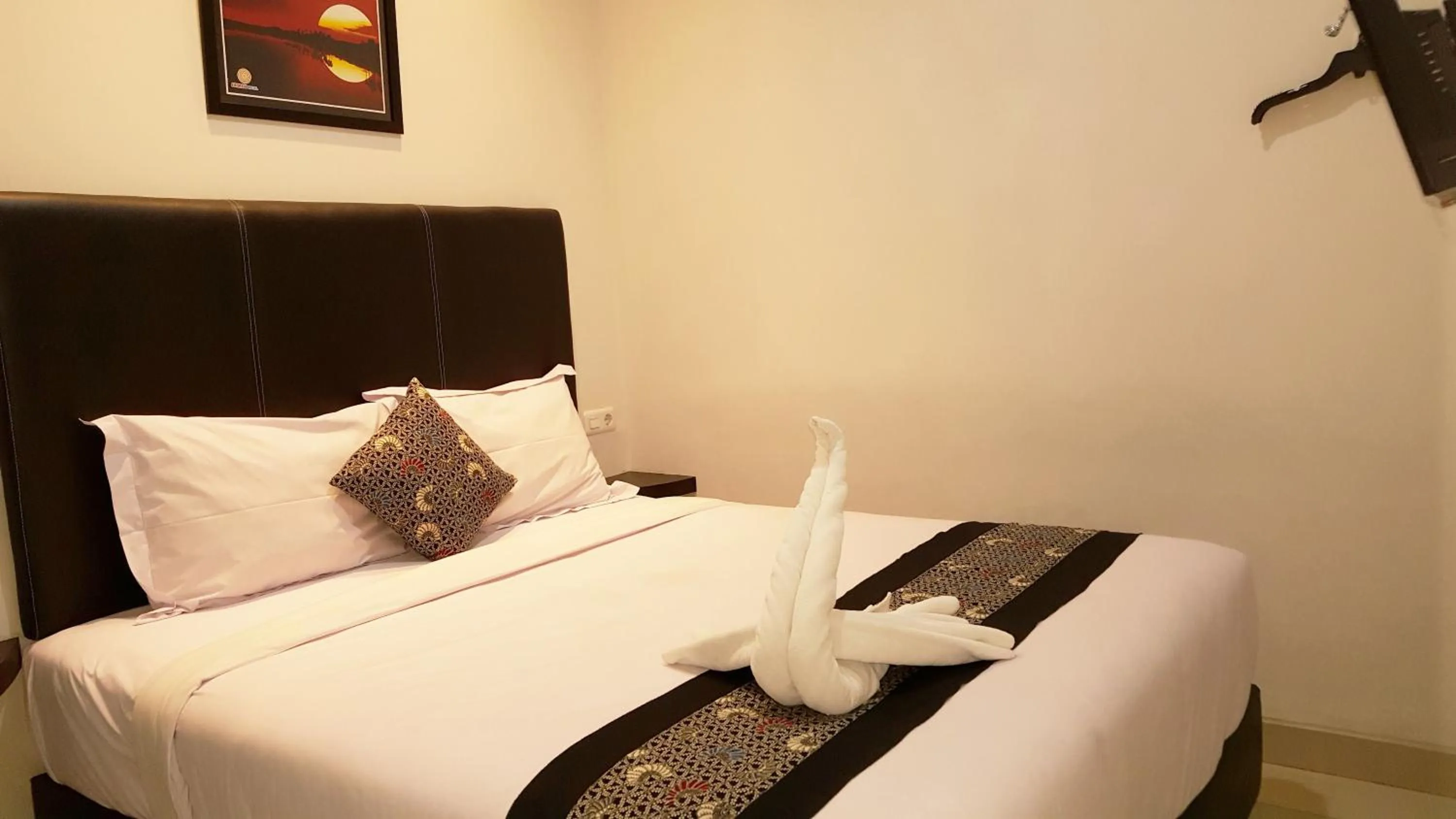 Bed in Sunrise Hotel Jombor Jogja