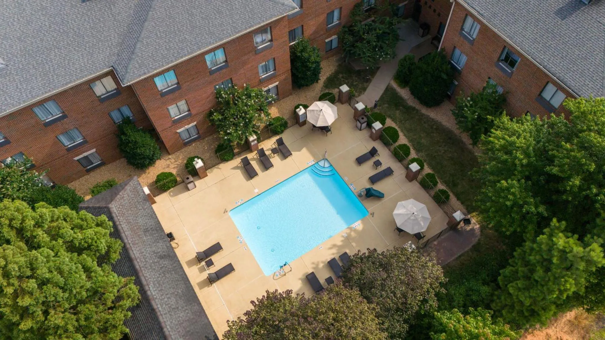 Swimming pool in Holiday Inn Express Hotel & Suites Wake Forest - Raleigh North by IHG