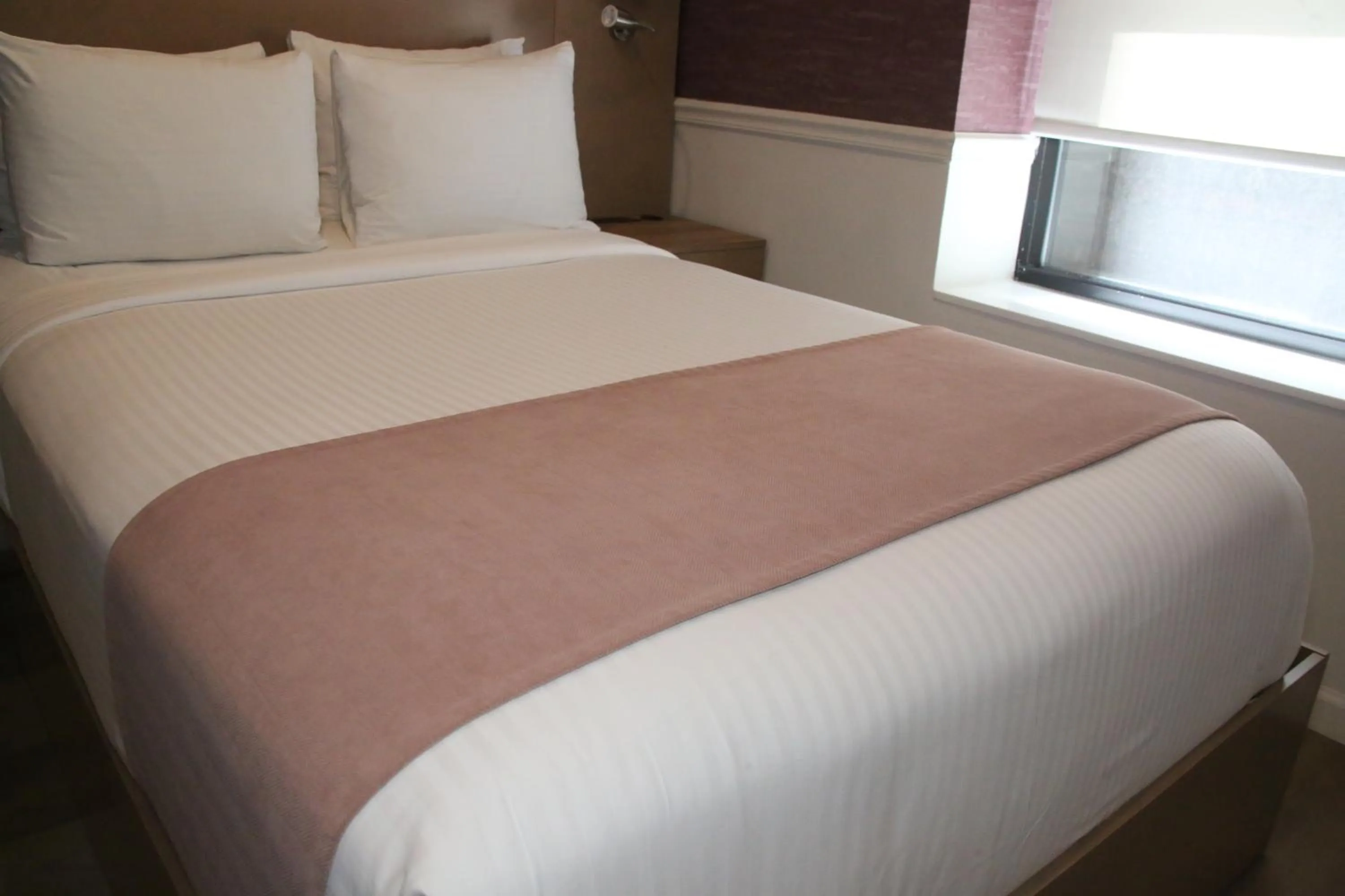 Bed in The Mayfair Hotel Times Square, Ascend Hotel Collection