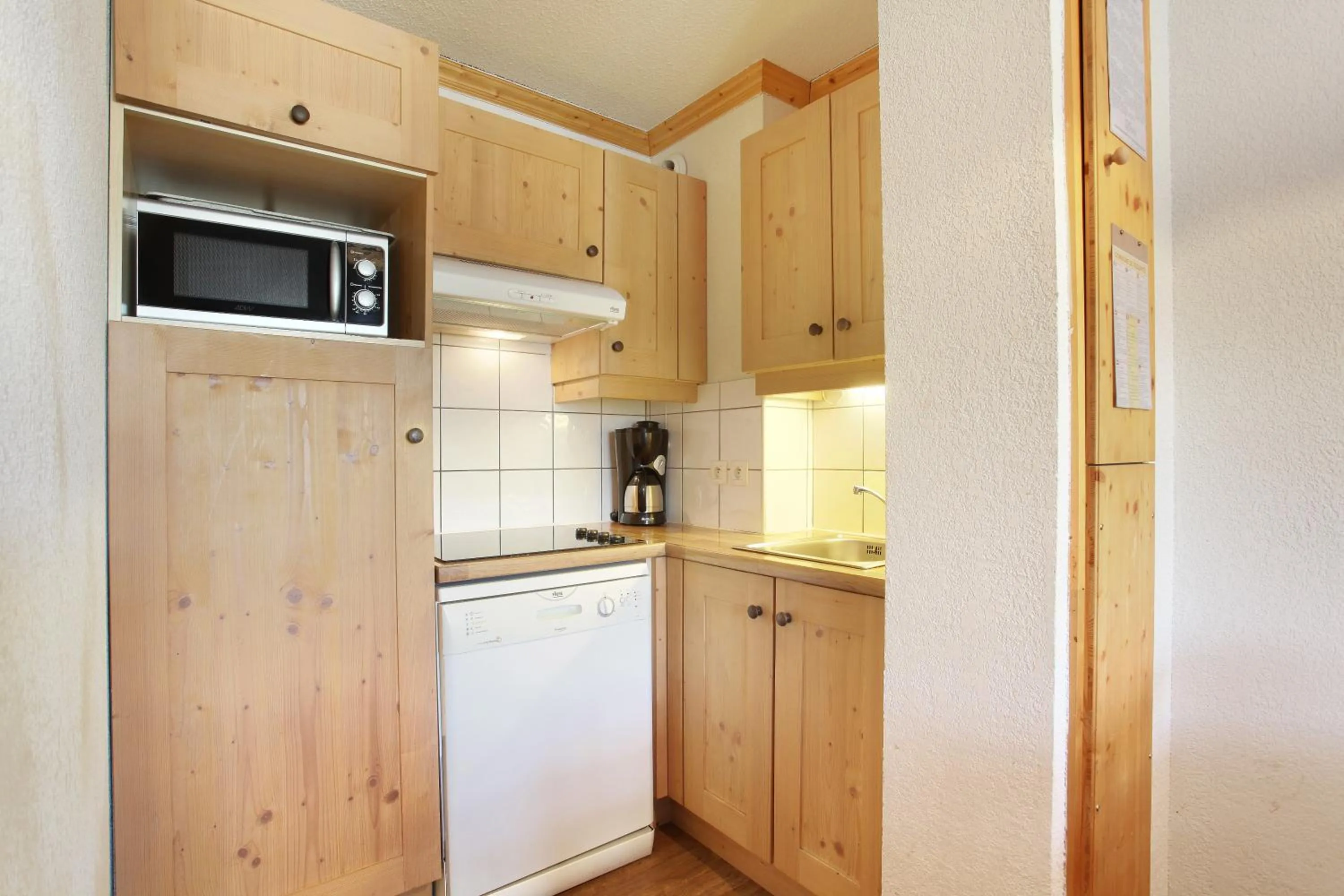 Kitchen or kitchenette in Résidence Odalys Le Village