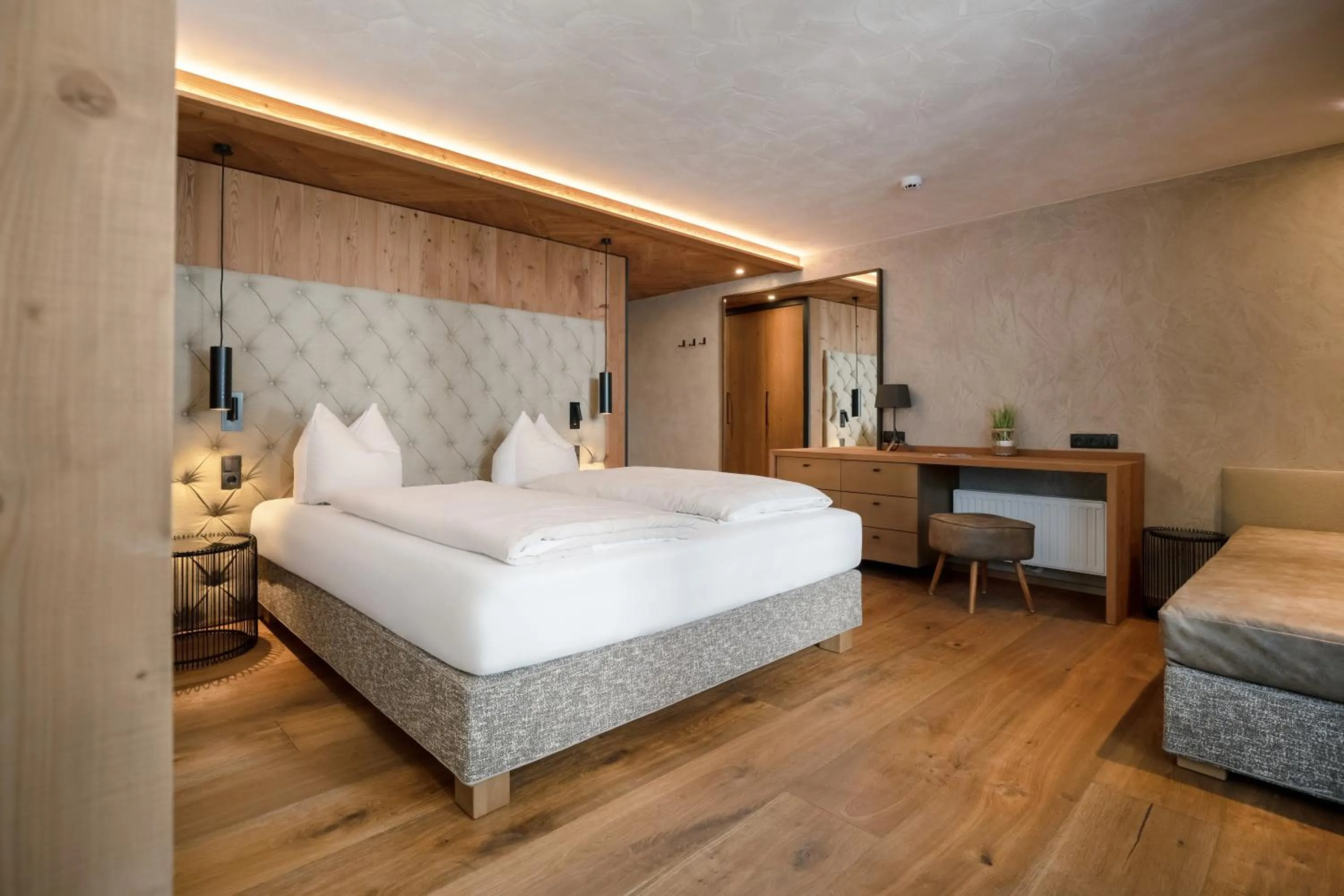 Photo of the whole room, Bed in SonnenHOF hotel gerlos centrum