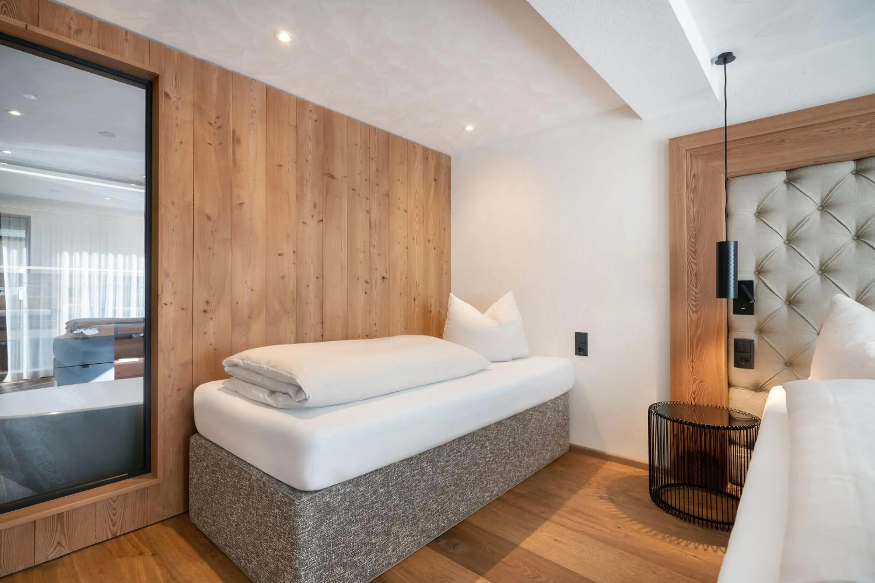 Photo of the whole room, Bed in SonnenHOF hotel gerlos centrum