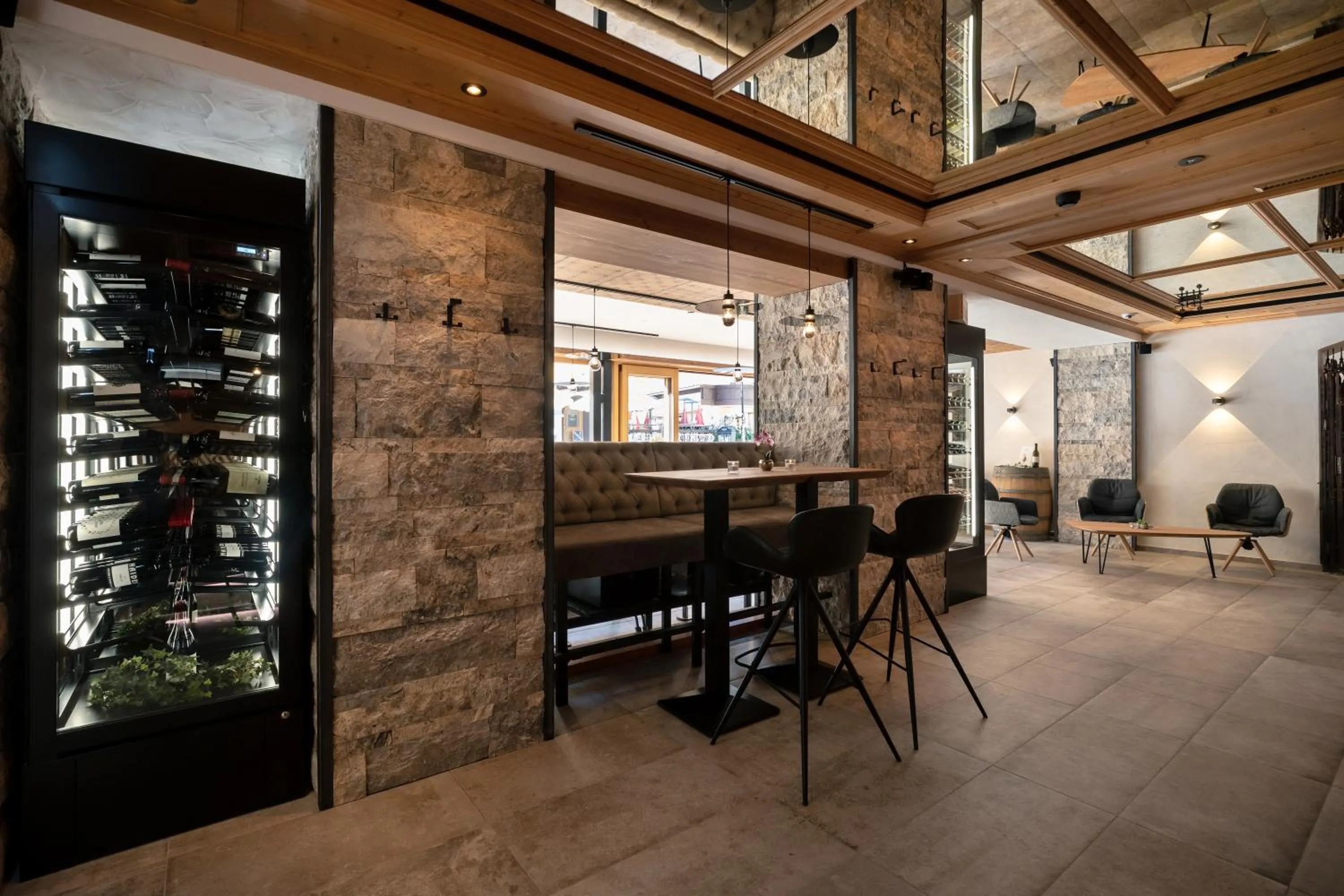 Lounge or bar in SonnenHOF hotel gerlos centrum