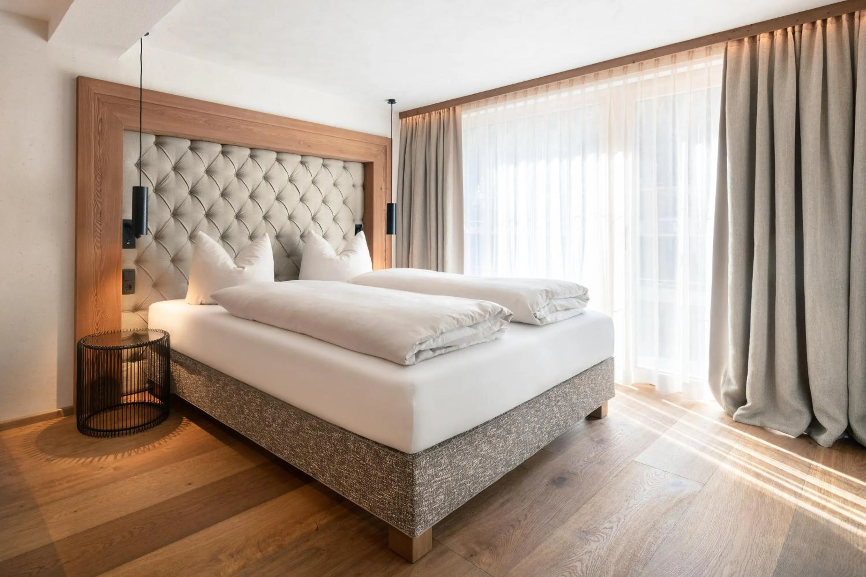 Photo of the whole room, Bed in SonnenHOF hotel gerlos centrum
