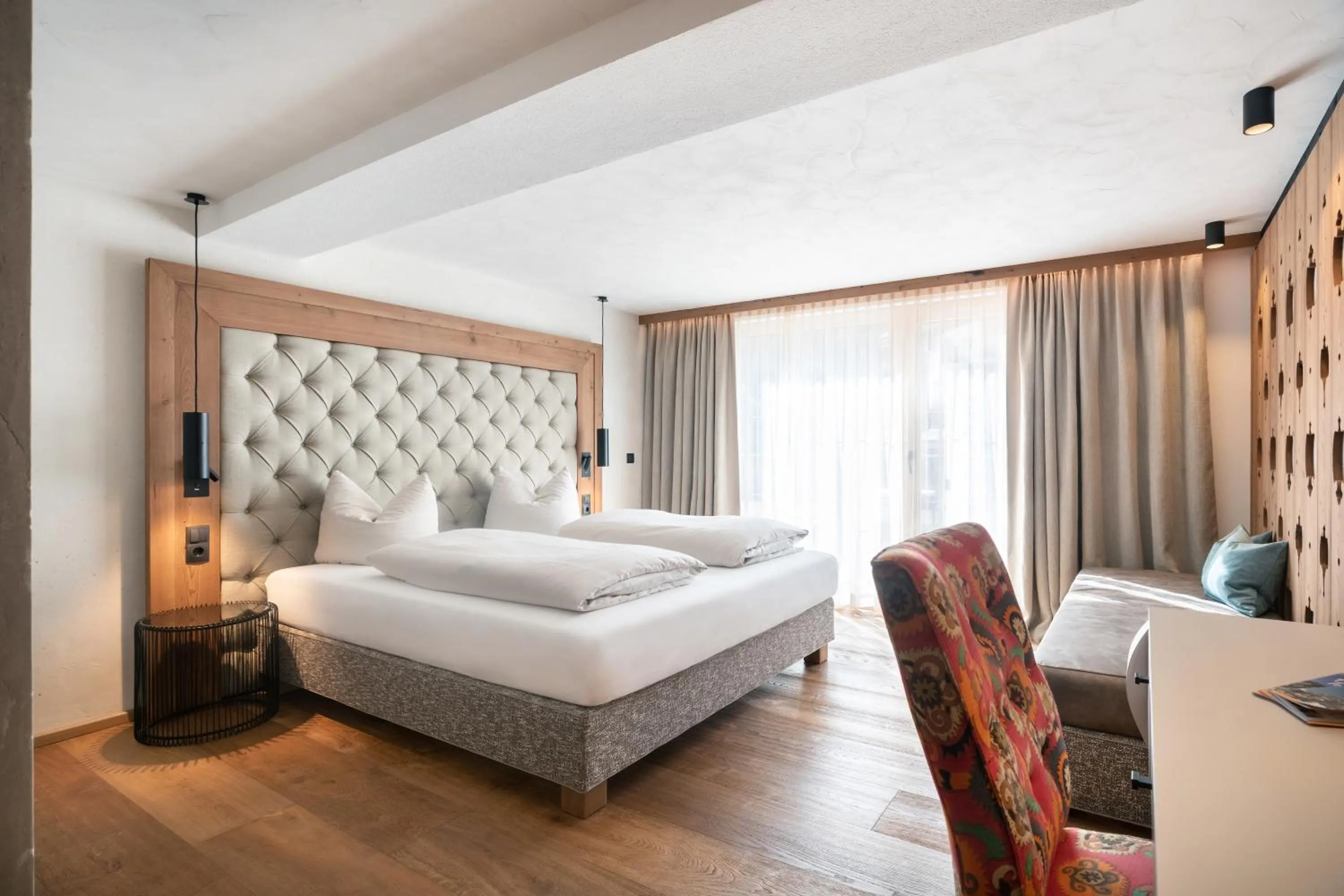 Photo of the whole room, Bed in SonnenHOF hotel gerlos centrum