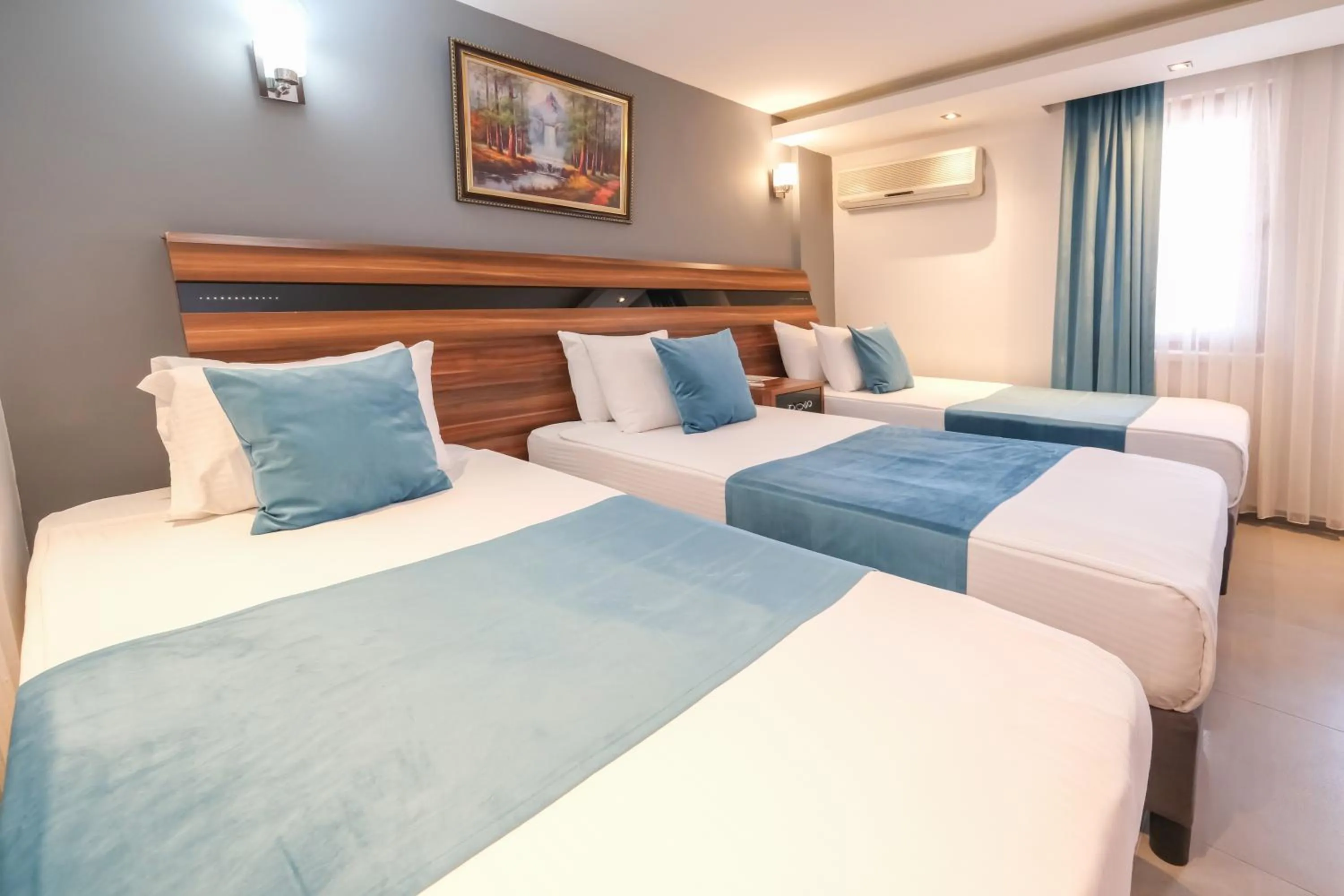 Bed in SIGNATURE GARDEN AVANOS Hotel & SPA