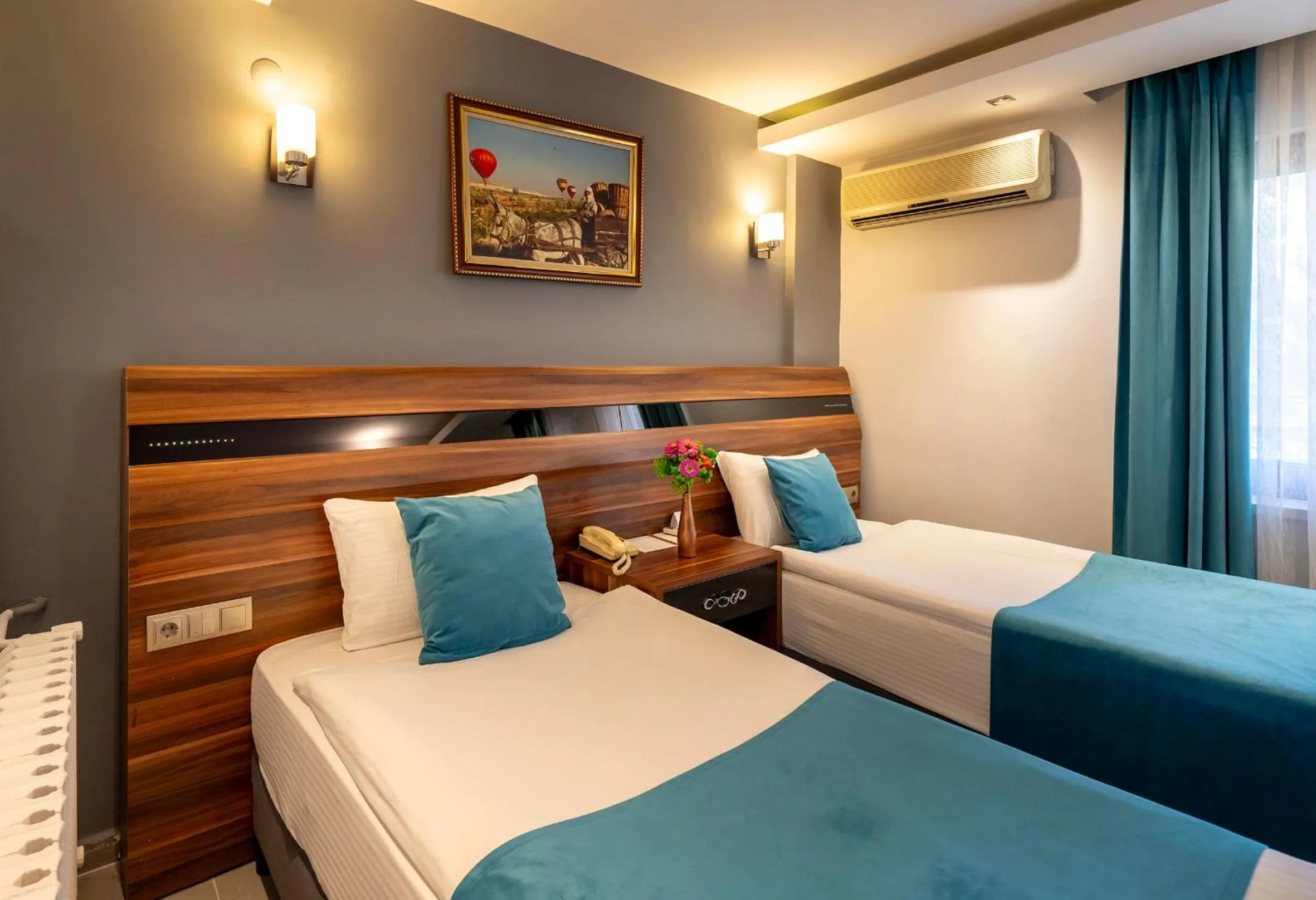 Bed in SIGNATURE GARDEN AVANOS Hotel & SPA