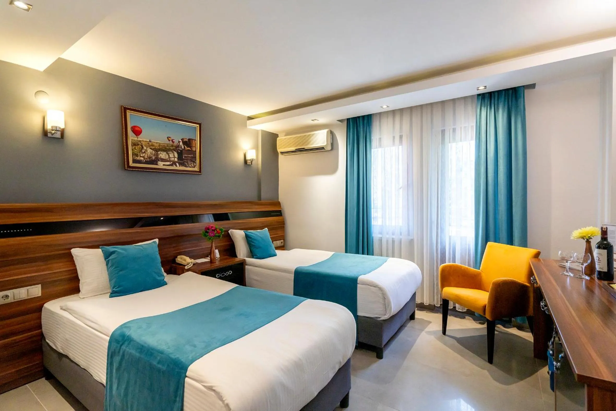 Bed in SIGNATURE GARDEN AVANOS Hotel & SPA