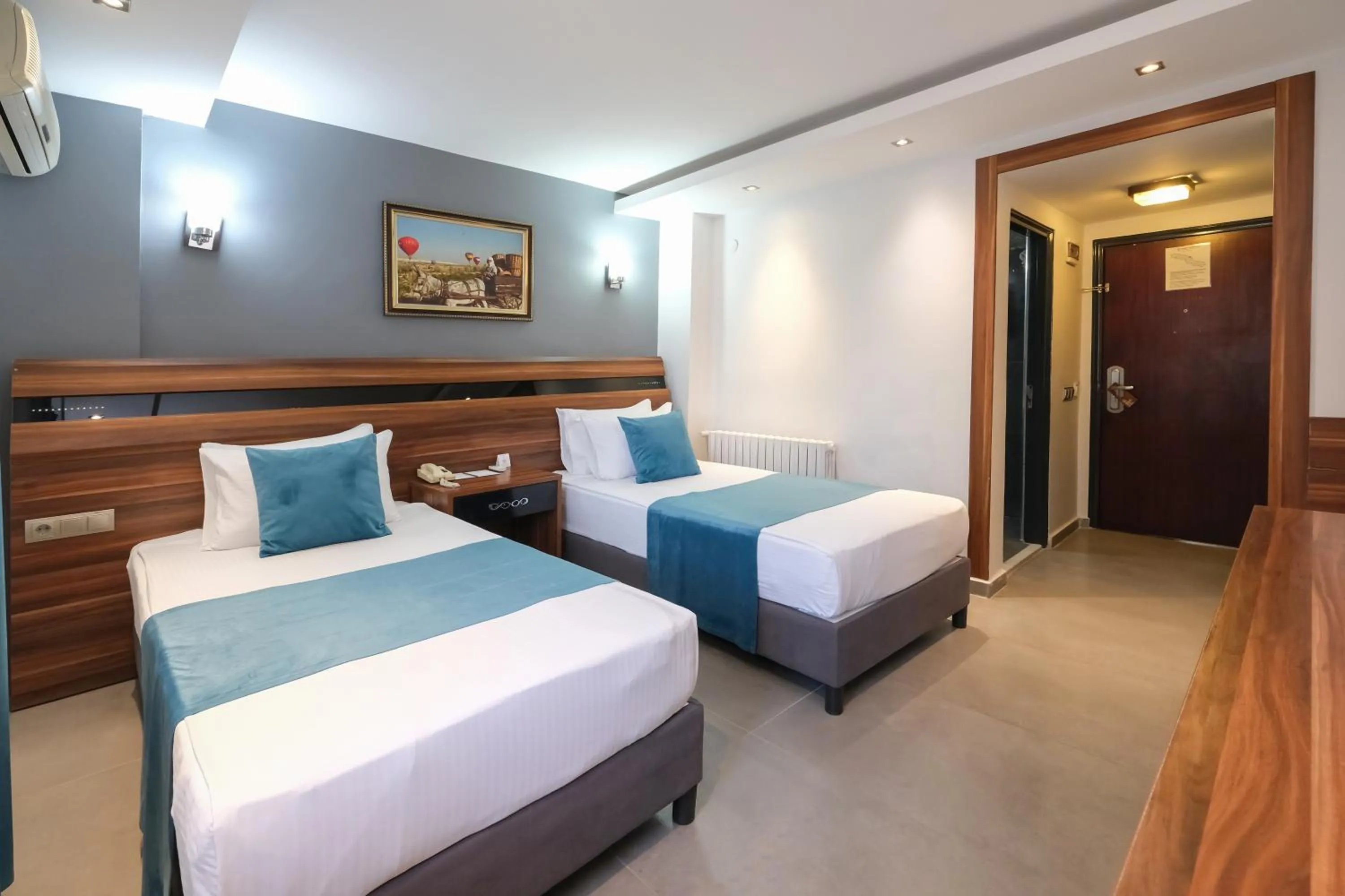 Bed in SIGNATURE GARDEN AVANOS Hotel & SPA