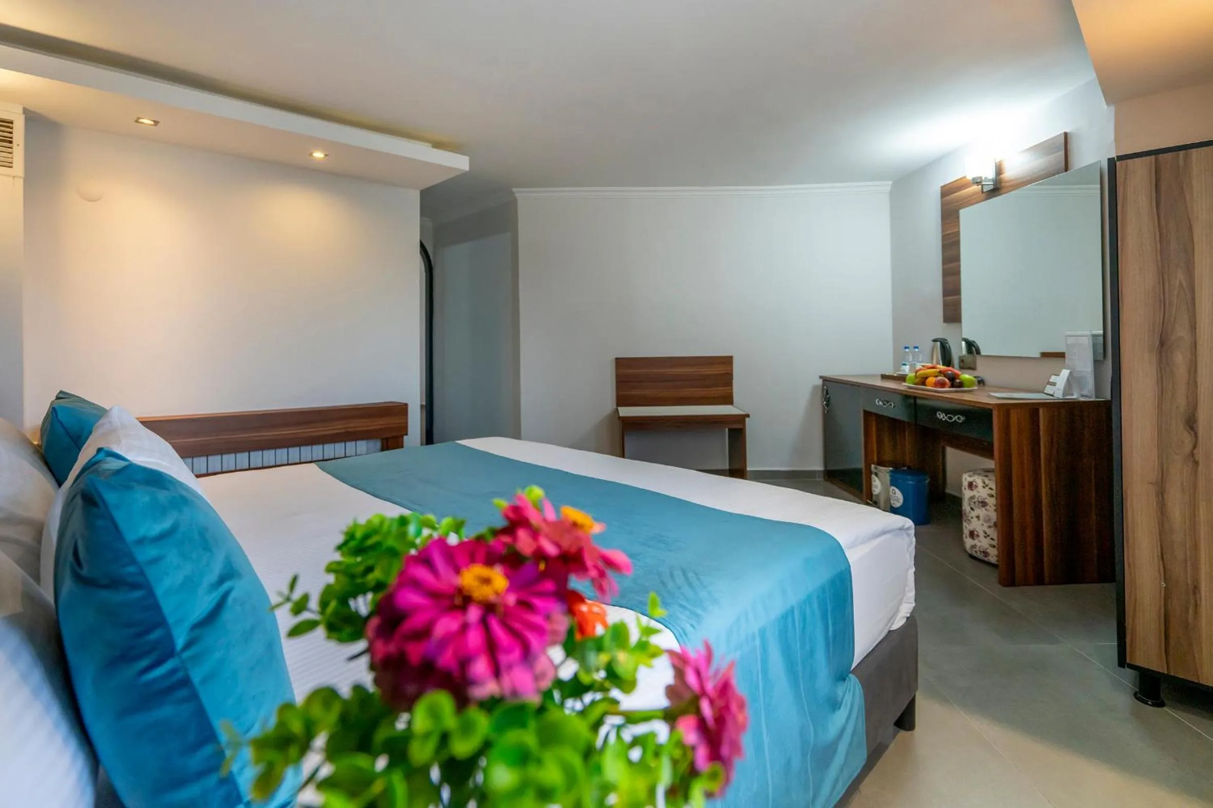 Bed in SIGNATURE GARDEN AVANOS Hotel & SPA