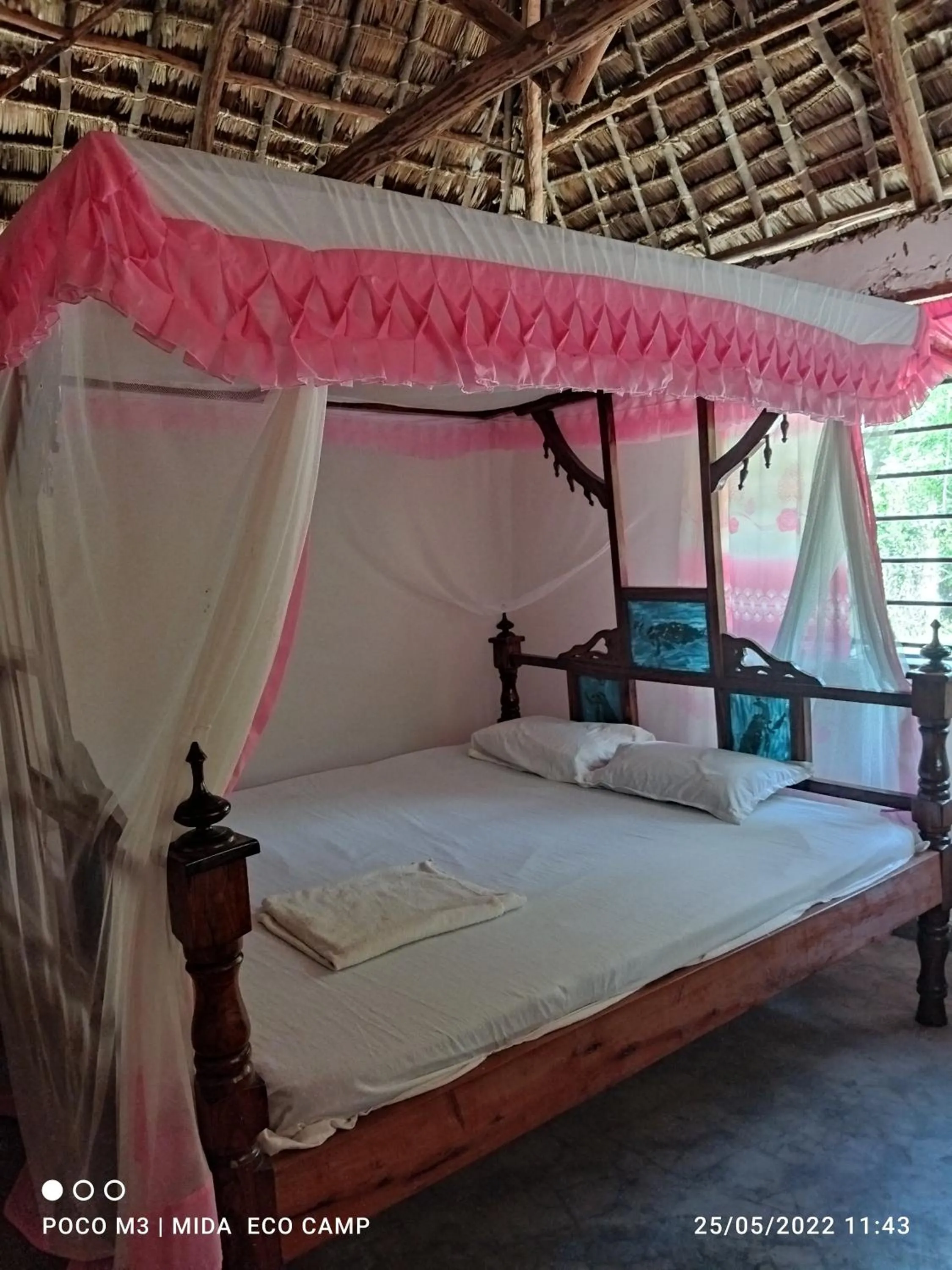 Bed in Mida Creek Eco Camp
